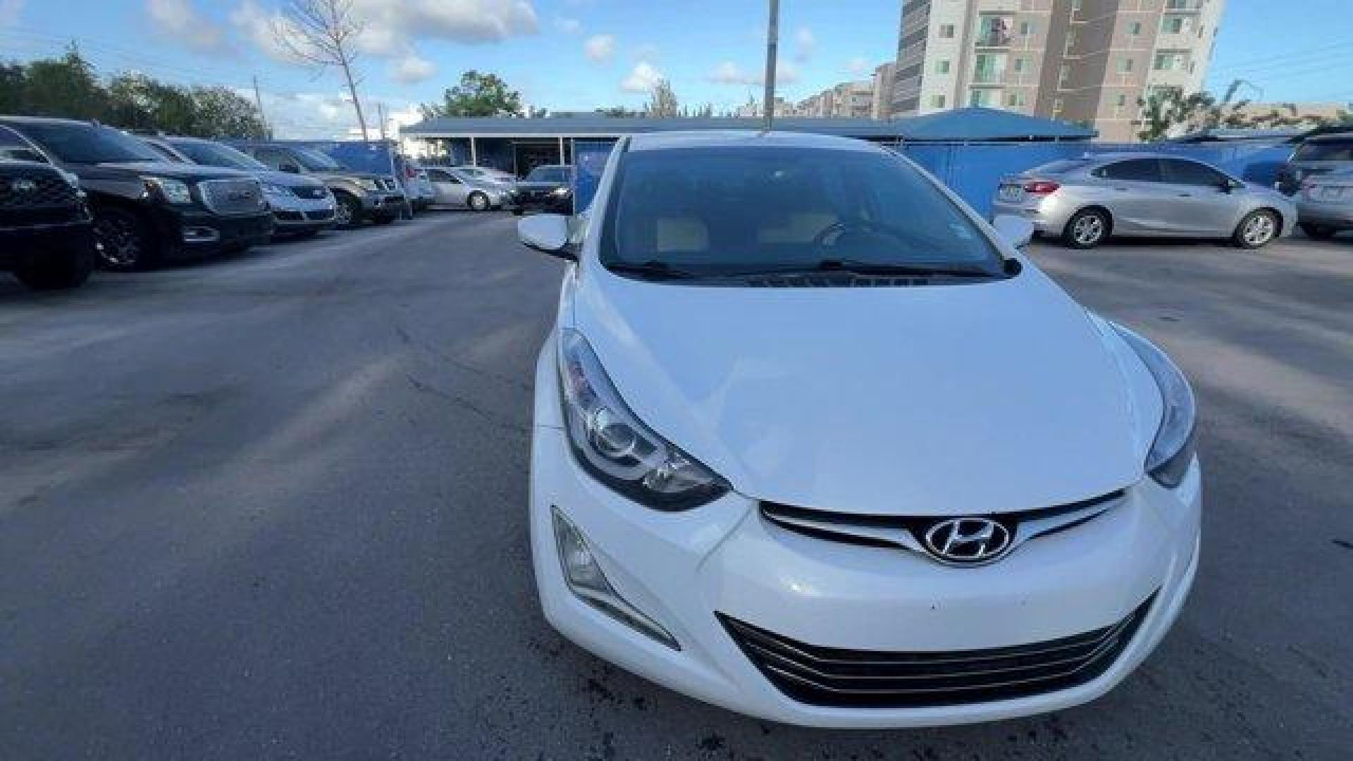 2015 Quartz White Pearl /Beige Hyundai Elantra Limited (5NPDH4AE2FH) with an 4 1.8 L engine, Automatic transmission, located at 27610 S Dixie Hwy, Homestead, FL, 33032, (305) 749-2348, 25.510241, -80.438301 - IIHS Top Safety Pick. Boasts 37 Highway MPG and 27 City MPG! This Hyundai Elantra boasts a Regular Unleaded I-4 1.8 L/110 engine powering this Automatic transmission. QUARTZ WHITE PEARL, CARPETED FLOOR MATS, BEIGE, LEATHER SEATING SURFACES.*This Hyundai Elantra Comes Equipped with These Options *Win - Photo#7