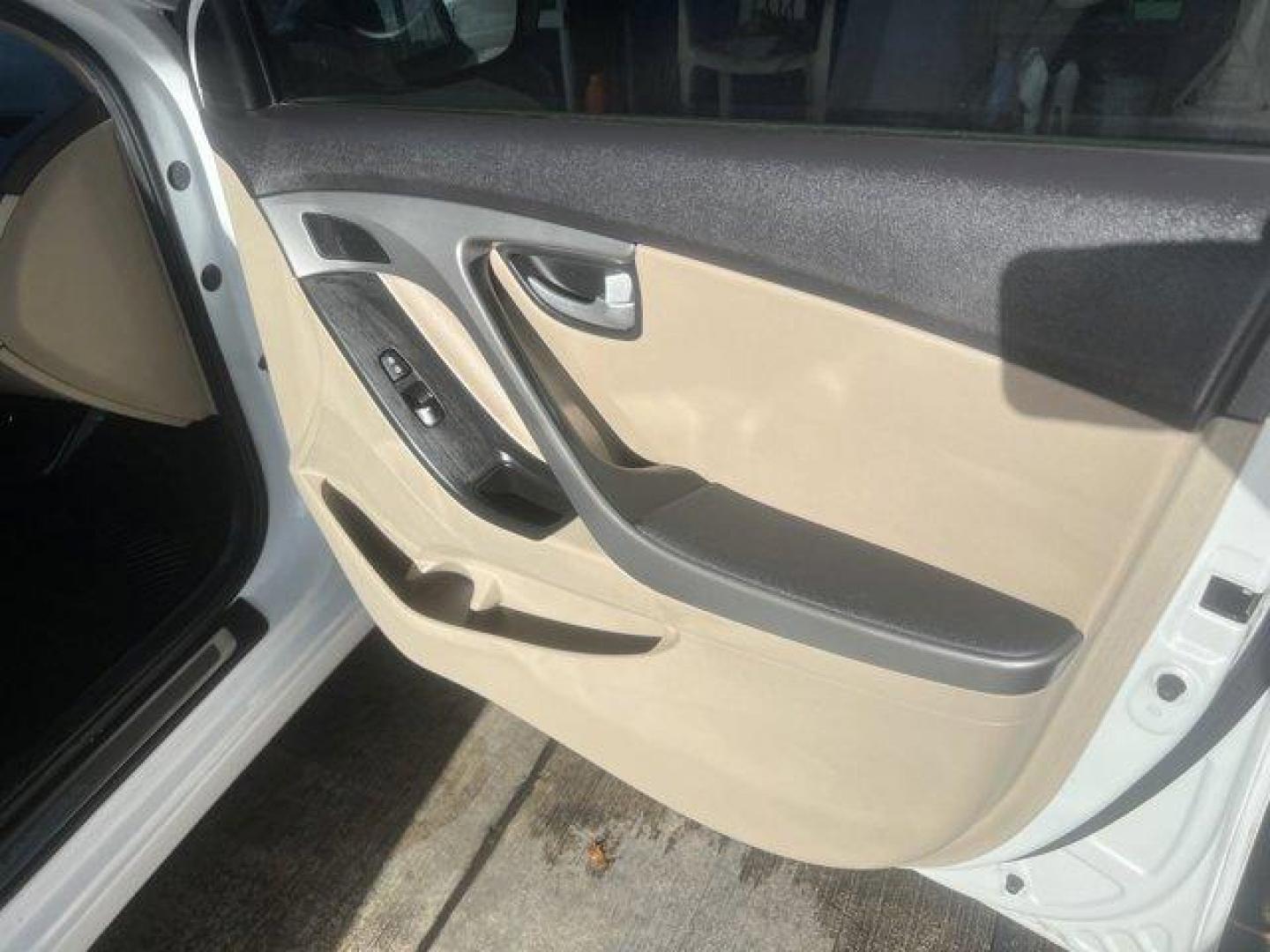 2015 Quartz White Pearl /Beige Hyundai Elantra Limited (5NPDH4AE2FH) with an 4 1.8 L engine, Automatic transmission, located at 27610 S Dixie Hwy, Homestead, FL, 33032, (305) 749-2348, 25.510241, -80.438301 - IIHS Top Safety Pick. Boasts 37 Highway MPG and 27 City MPG! This Hyundai Elantra boasts a Regular Unleaded I-4 1.8 L/110 engine powering this Automatic transmission. QUARTZ WHITE PEARL, CARPETED FLOOR MATS, BEIGE, LEATHER SEATING SURFACES.*This Hyundai Elantra Comes Equipped with These Options *Win - Photo#12