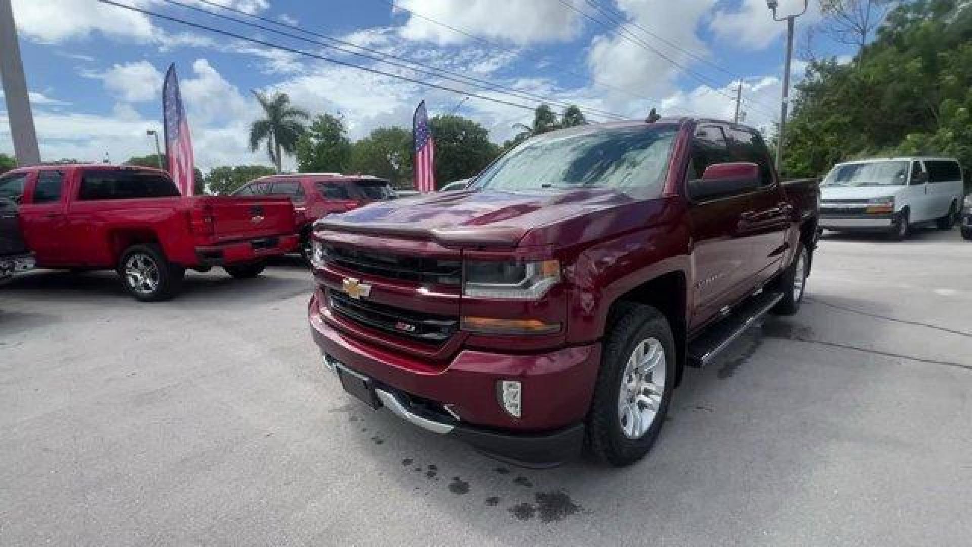 2016 Siren Red Tintcoat /Jet Black Chevrolet Silverado 1500 LT (3GCUKREC8GG) with an 8 5.3L engine, Automatic transmission, located at 27610 S Dixie Hwy, Homestead, FL, 33032, (305) 749-2348, 25.510241, -80.438301 - Boasts 22 Highway MPG and 16 City MPG! This Chevrolet Silverado 1500 delivers a Gas/Ethanol V8 5.3L/325 engine powering this Automatic transmission. WHEELS, 18 X 8.5 (45.7 CM X 21.6 CM) BRIGHT-MACHINED ALUMINUM (STD), WHEEL, FULL-SIZE SPARE, 17 (43.2 CM) STEEL, TRANSMISSION, 6-SPEED AUTOMATIC, ELECT - Photo#0