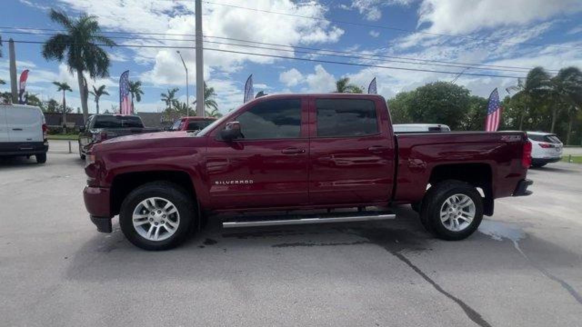 2016 Siren Red Tintcoat /Jet Black Chevrolet Silverado 1500 LT (3GCUKREC8GG) with an 8 5.3L engine, Automatic transmission, located at 27610 S Dixie Hwy, Homestead, FL, 33032, (305) 749-2348, 25.510241, -80.438301 - Boasts 22 Highway MPG and 16 City MPG! This Chevrolet Silverado 1500 delivers a Gas/Ethanol V8 5.3L/325 engine powering this Automatic transmission. WHEELS, 18 X 8.5 (45.7 CM X 21.6 CM) BRIGHT-MACHINED ALUMINUM (STD), WHEEL, FULL-SIZE SPARE, 17 (43.2 CM) STEEL, TRANSMISSION, 6-SPEED AUTOMATIC, ELECT - Photo#1