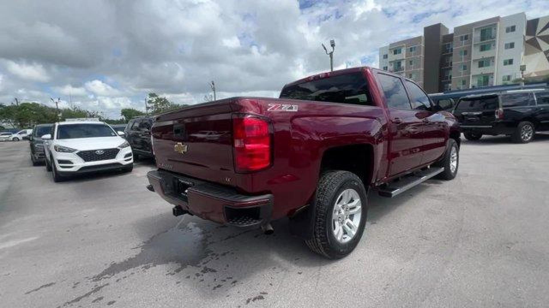 2016 Siren Red Tintcoat /Jet Black Chevrolet Silverado 1500 LT (3GCUKREC8GG) with an 8 5.3L engine, Automatic transmission, located at 27610 S Dixie Hwy, Homestead, FL, 33032, (305) 749-2348, 25.510241, -80.438301 - Boasts 22 Highway MPG and 16 City MPG! This Chevrolet Silverado 1500 delivers a Gas/Ethanol V8 5.3L/325 engine powering this Automatic transmission. WHEELS, 18 X 8.5 (45.7 CM X 21.6 CM) BRIGHT-MACHINED ALUMINUM (STD), WHEEL, FULL-SIZE SPARE, 17 (43.2 CM) STEEL, TRANSMISSION, 6-SPEED AUTOMATIC, ELECT - Photo#4