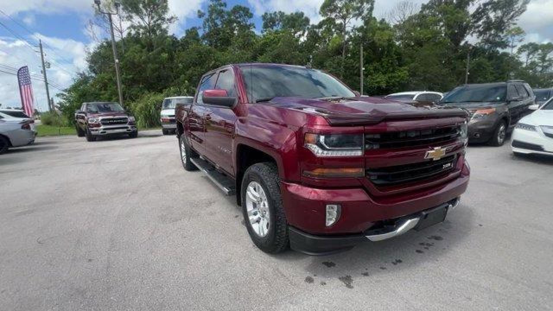 2016 Siren Red Tintcoat /Jet Black Chevrolet Silverado 1500 LT (3GCUKREC8GG) with an 8 5.3L engine, Automatic transmission, located at 27610 S Dixie Hwy, Homestead, FL, 33032, (305) 749-2348, 25.510241, -80.438301 - Boasts 22 Highway MPG and 16 City MPG! This Chevrolet Silverado 1500 delivers a Gas/Ethanol V8 5.3L/325 engine powering this Automatic transmission. WHEELS, 18 X 8.5 (45.7 CM X 21.6 CM) BRIGHT-MACHINED ALUMINUM (STD), WHEEL, FULL-SIZE SPARE, 17 (43.2 CM) STEEL, TRANSMISSION, 6-SPEED AUTOMATIC, ELECT - Photo#6