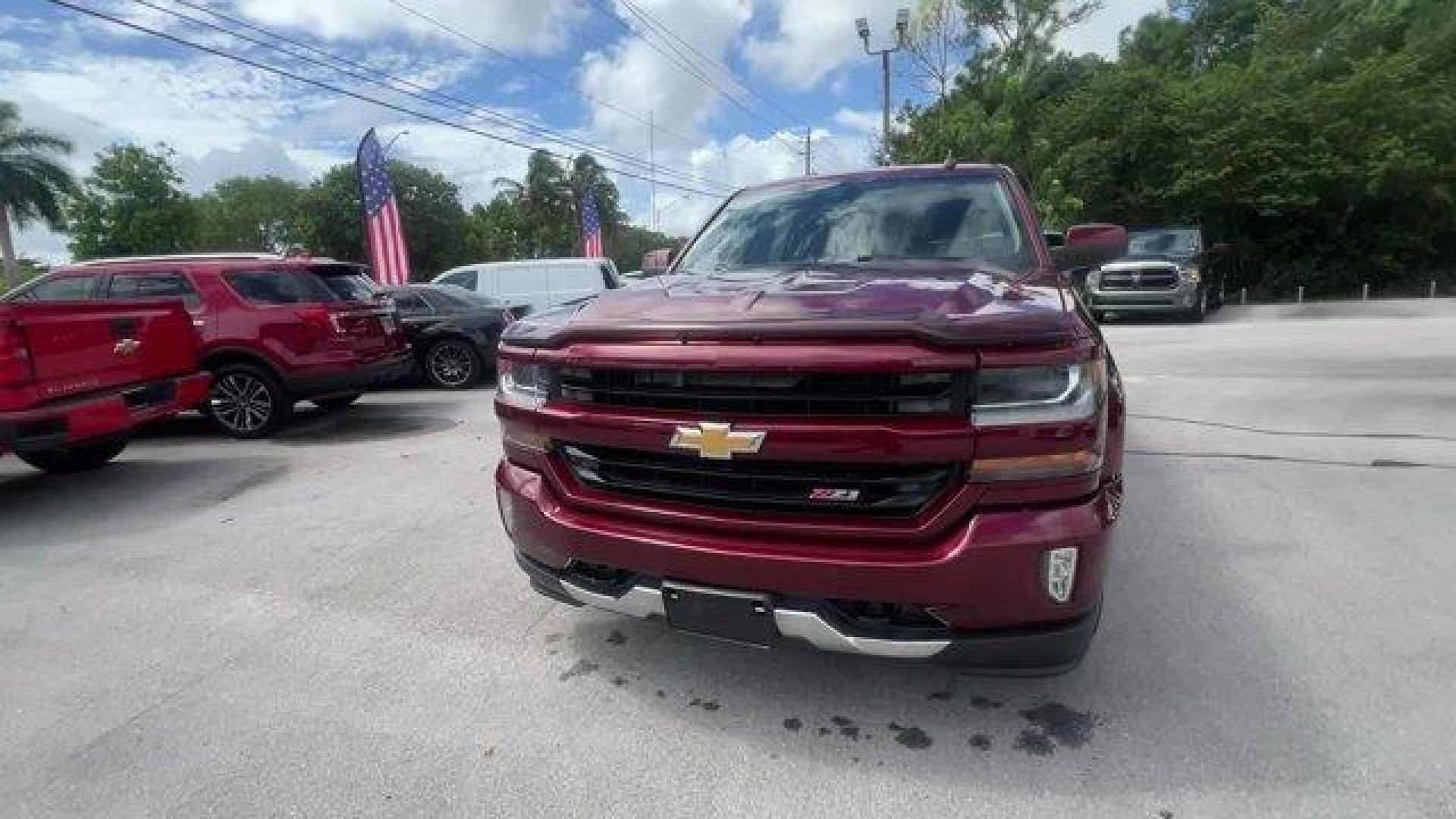 2016 Siren Red Tintcoat /Jet Black Chevrolet Silverado 1500 LT (3GCUKREC8GG) with an 8 5.3L engine, Automatic transmission, located at 27610 S Dixie Hwy, Homestead, FL, 33032, (305) 749-2348, 25.510241, -80.438301 - Boasts 22 Highway MPG and 16 City MPG! This Chevrolet Silverado 1500 delivers a Gas/Ethanol V8 5.3L/325 engine powering this Automatic transmission. WHEELS, 18 X 8.5 (45.7 CM X 21.6 CM) BRIGHT-MACHINED ALUMINUM (STD), WHEEL, FULL-SIZE SPARE, 17 (43.2 CM) STEEL, TRANSMISSION, 6-SPEED AUTOMATIC, ELECT - Photo#7