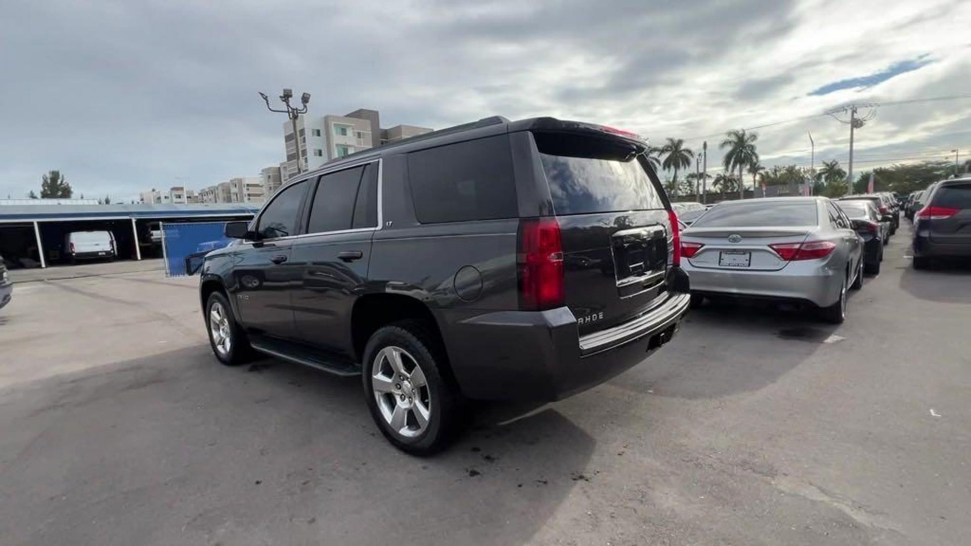 2016 Tungsten Metallic /Black Chevrolet Tahoe LT (1GNSCBKC1GR) with an EcoTec3 5.3L V8 engine, Automatic transmission, located at 27610 S Dixie Hwy, Homestead, FL, 33032, (305) 749-2348, 25.510241, -80.438301 - Photo#2