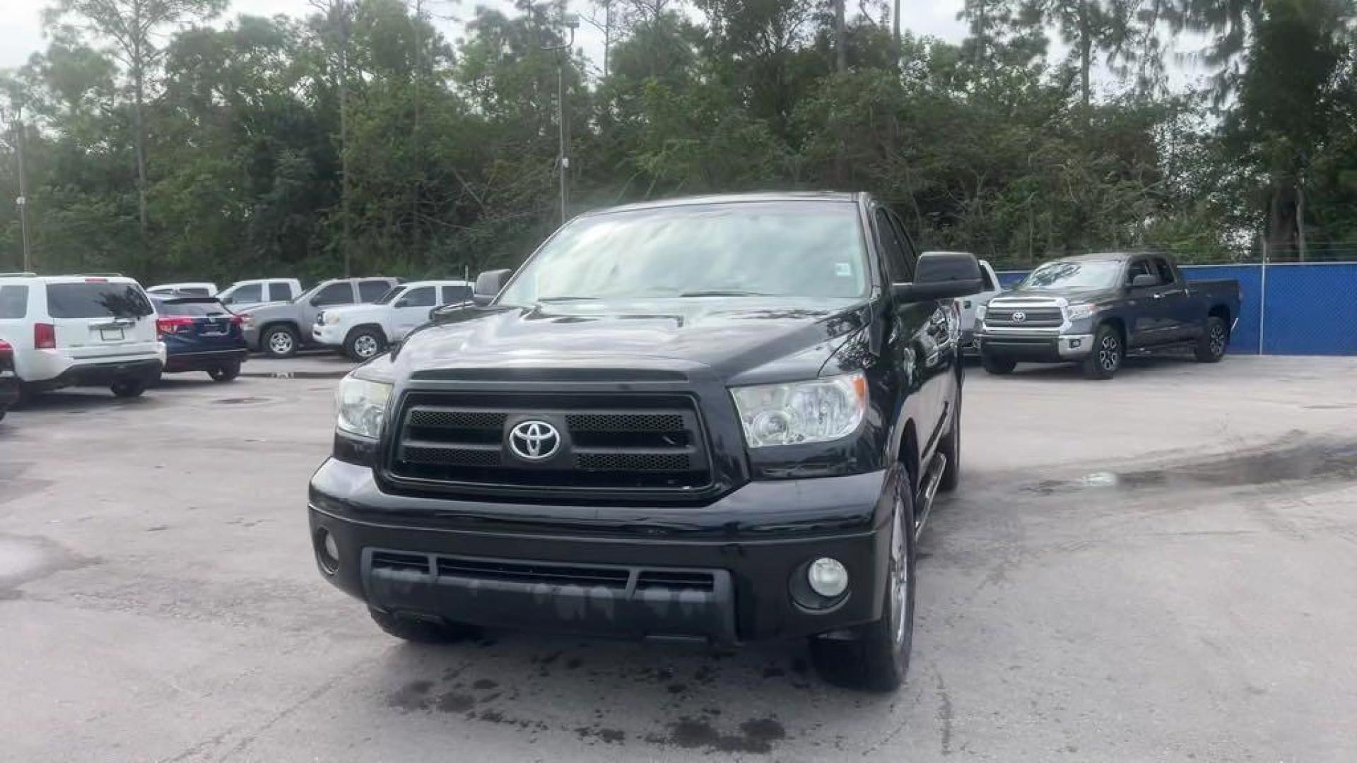 2011 Black Toyota Tundra Grade (5TFRY5F16BX) with an i-Force 5.7L V8 DOHC engine, Automatic transmission, located at 27610 S Dixie Hwy, Homestead, FL, 33032, (305) 749-2348, 25.510241, -80.438301 - Photo#0