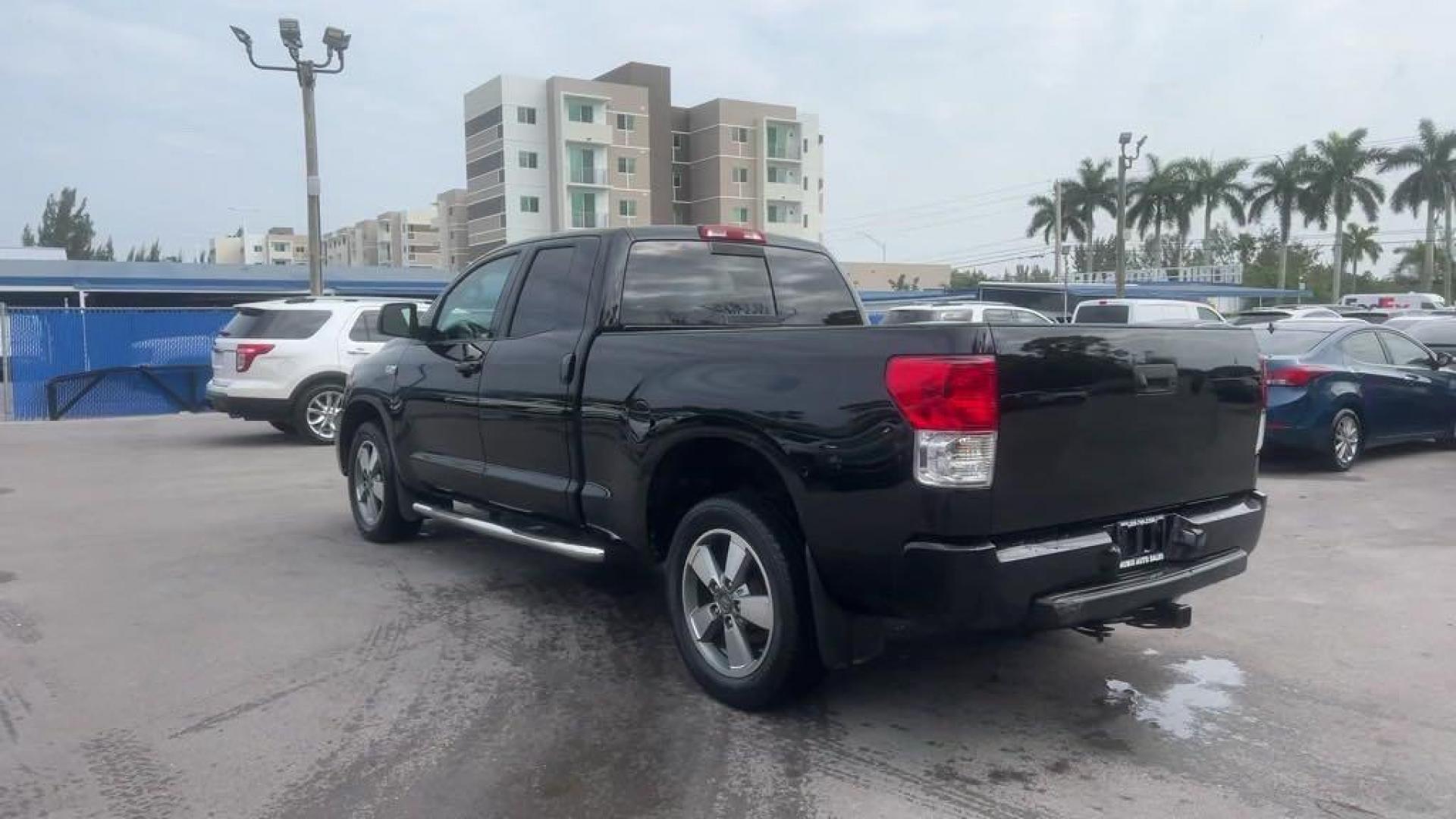 2011 Black Toyota Tundra Grade (5TFRY5F16BX) with an i-Force 5.7L V8 DOHC engine, Automatic transmission, located at 27610 S Dixie Hwy, Homestead, FL, 33032, (305) 749-2348, 25.510241, -80.438301 - Photo#2