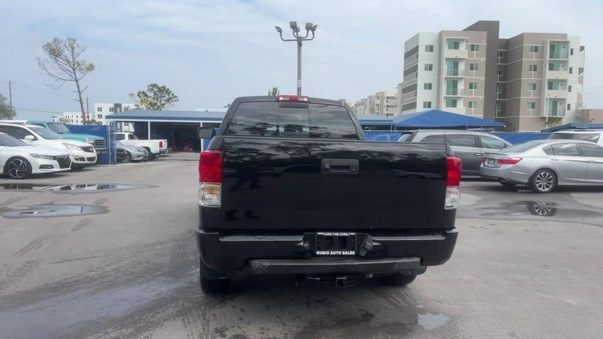 2011 Black Toyota Tundra Grade (5TFRY5F16BX) with an i-Force 5.7L V8 DOHC engine, Automatic transmission, located at 27610 S Dixie Hwy, Homestead, FL, 33032, (305) 749-2348, 25.510241, -80.438301 - Photo#3