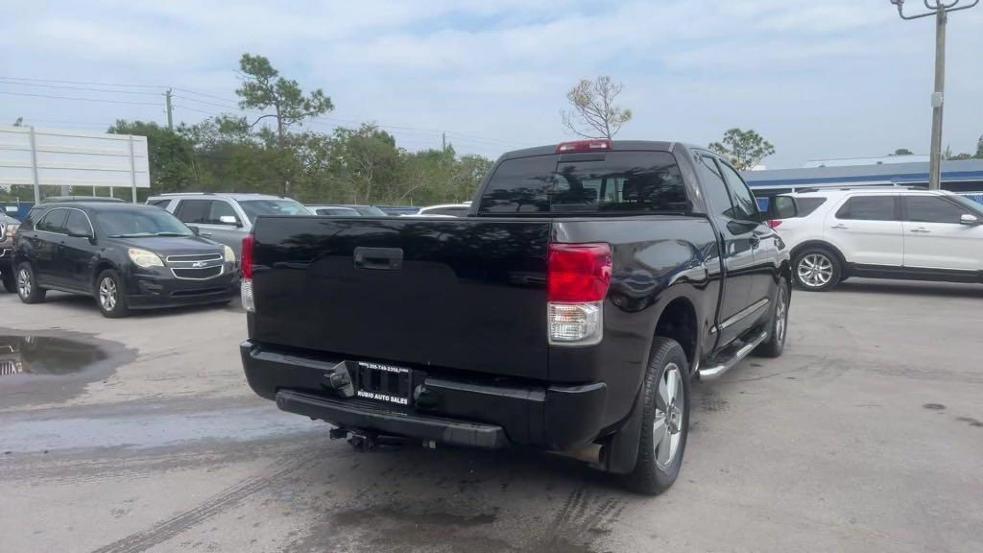 2011 Black Toyota Tundra Grade (5TFRY5F16BX) with an i-Force 5.7L V8 DOHC engine, Automatic transmission, located at 27610 S Dixie Hwy, Homestead, FL, 33032, (305) 749-2348, 25.510241, -80.438301 - Photo#4
