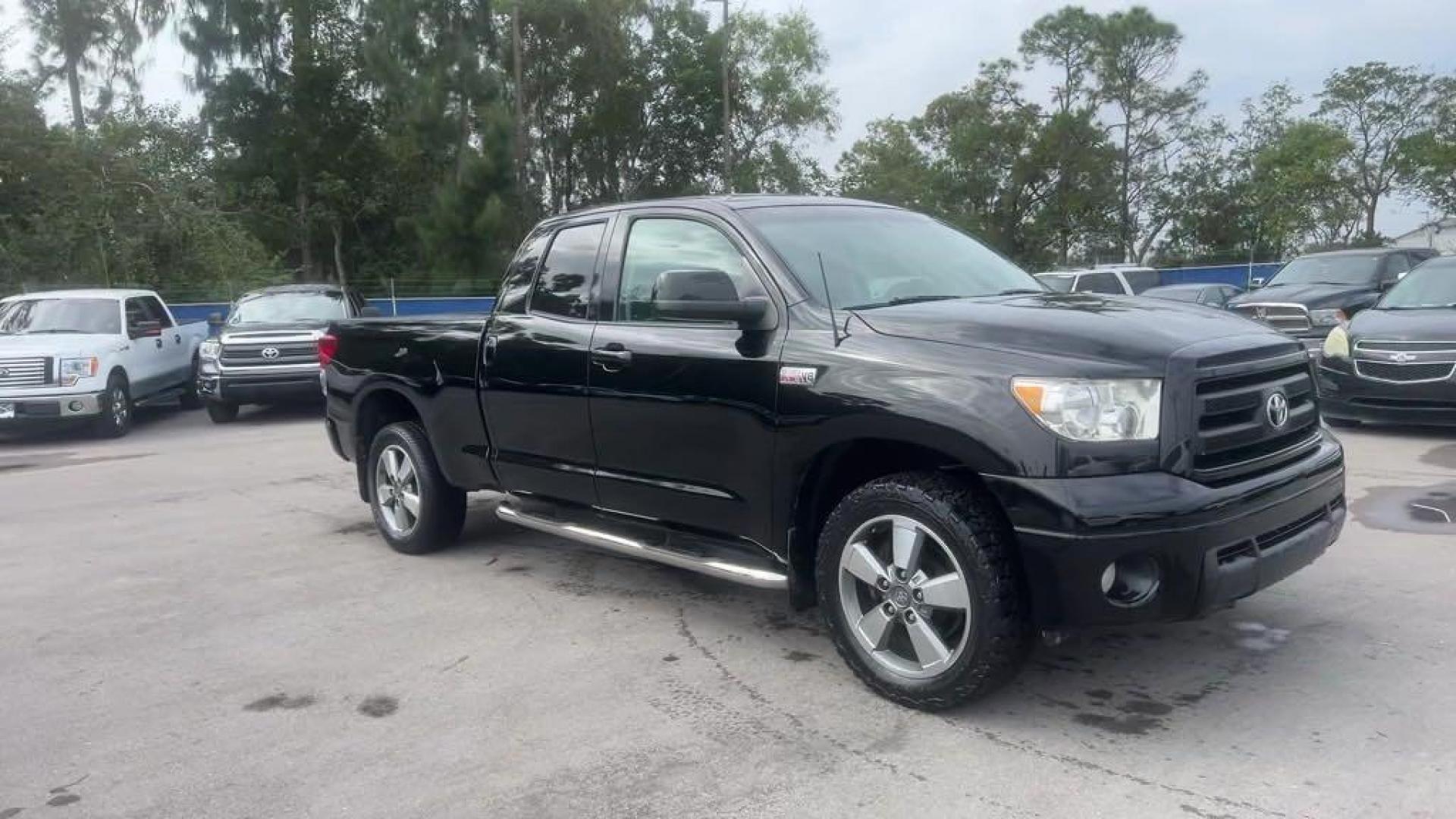 2011 Black Toyota Tundra Grade (5TFRY5F16BX) with an i-Force 5.7L V8 DOHC engine, Automatic transmission, located at 27610 S Dixie Hwy, Homestead, FL, 33032, (305) 749-2348, 25.510241, -80.438301 - Photo#6