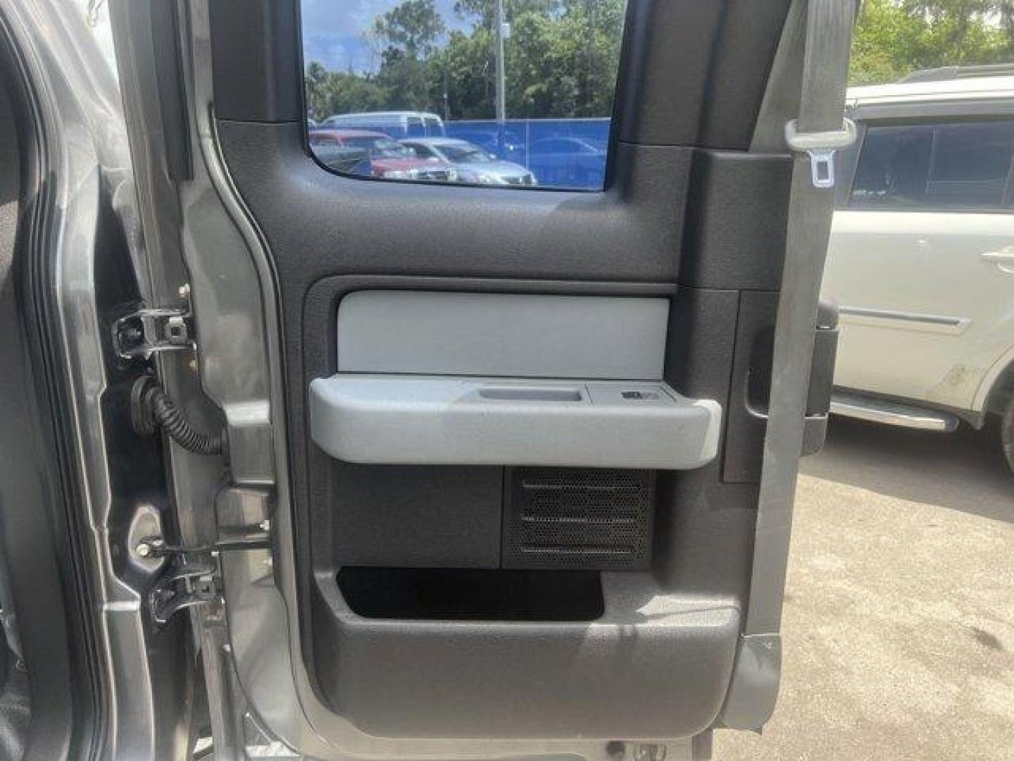 2013 Gray Ford F-150 (1FTEX1CM2DF) with an 6 3.7L engine, Automatic transmission, located at 27610 S Dixie Hwy, Homestead, FL, 33032, (305) 749-2348, 25.510241, -80.438301 - KBB.com Brand Image Awards. Boasts 23 Highway MPG and 17 City MPG! This Ford F-150 boasts a Gas/Ethanol V6 3.7L/227 engine powering this Automatic transmission. Variable interval wipers, Under frame winch-type spare tire carrier w/safety catch and lock, Trailer sway control.* This Ford F-150 Featu - Photo#12