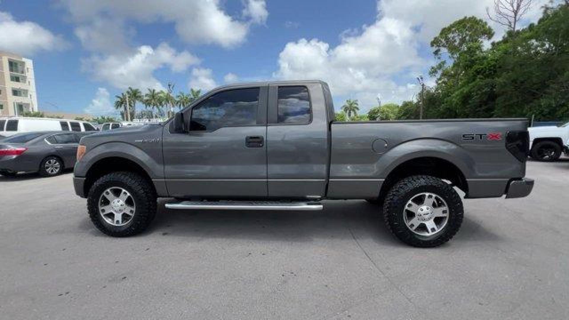 2013 Gray Ford F-150 (1FTEX1CM2DF) with an 6 3.7L engine, Automatic transmission, located at 27610 S Dixie Hwy, Homestead, FL, 33032, (305) 749-2348, 25.510241, -80.438301 - KBB.com Brand Image Awards. Boasts 23 Highway MPG and 17 City MPG! This Ford F-150 boasts a Gas/Ethanol V6 3.7L/227 engine powering this Automatic transmission. Variable interval wipers, Under frame winch-type spare tire carrier w/safety catch and lock, Trailer sway control.* This Ford F-150 Featu - Photo#1