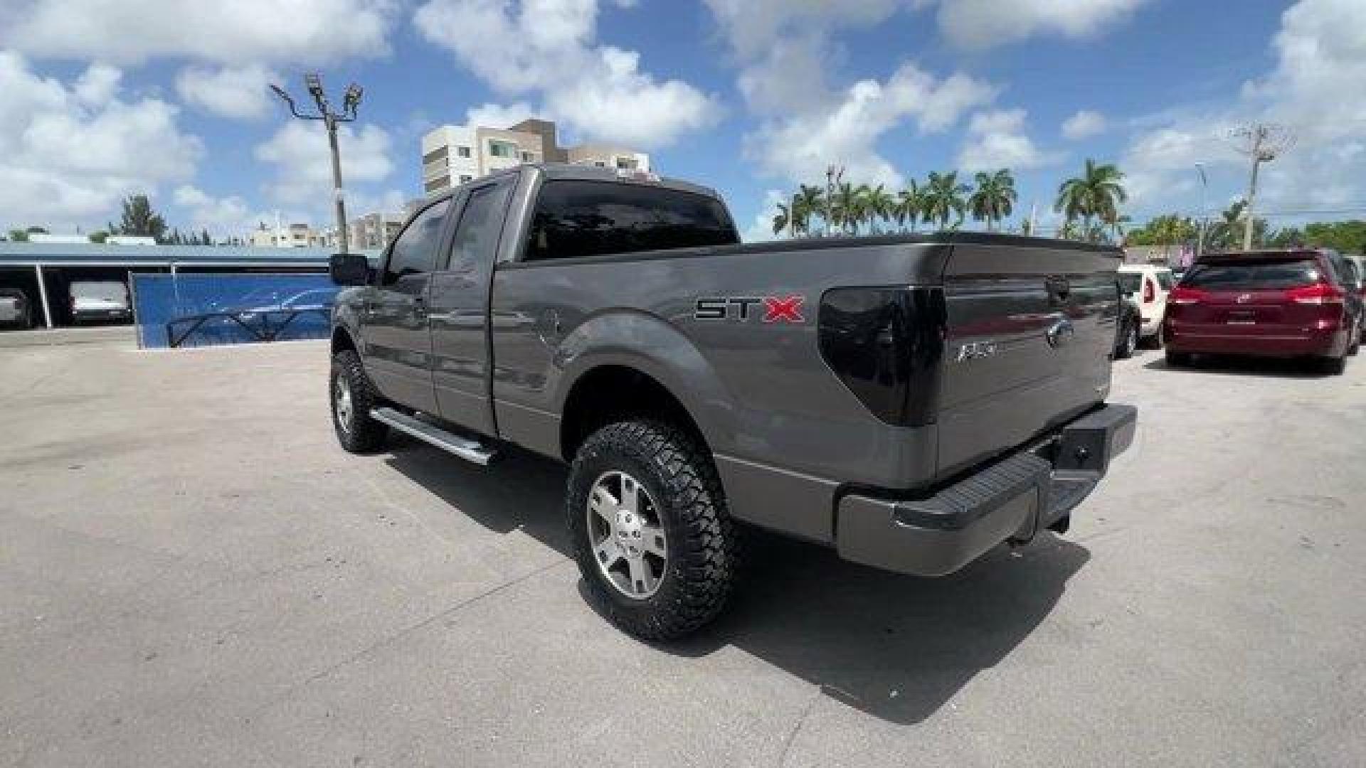 2013 Gray Ford F-150 (1FTEX1CM2DF) with an 6 3.7L engine, Automatic transmission, located at 27610 S Dixie Hwy, Homestead, FL, 33032, (305) 749-2348, 25.510241, -80.438301 - KBB.com Brand Image Awards. Boasts 23 Highway MPG and 17 City MPG! This Ford F-150 boasts a Gas/Ethanol V6 3.7L/227 engine powering this Automatic transmission. Variable interval wipers, Under frame winch-type spare tire carrier w/safety catch and lock, Trailer sway control.* This Ford F-150 Featu - Photo#2