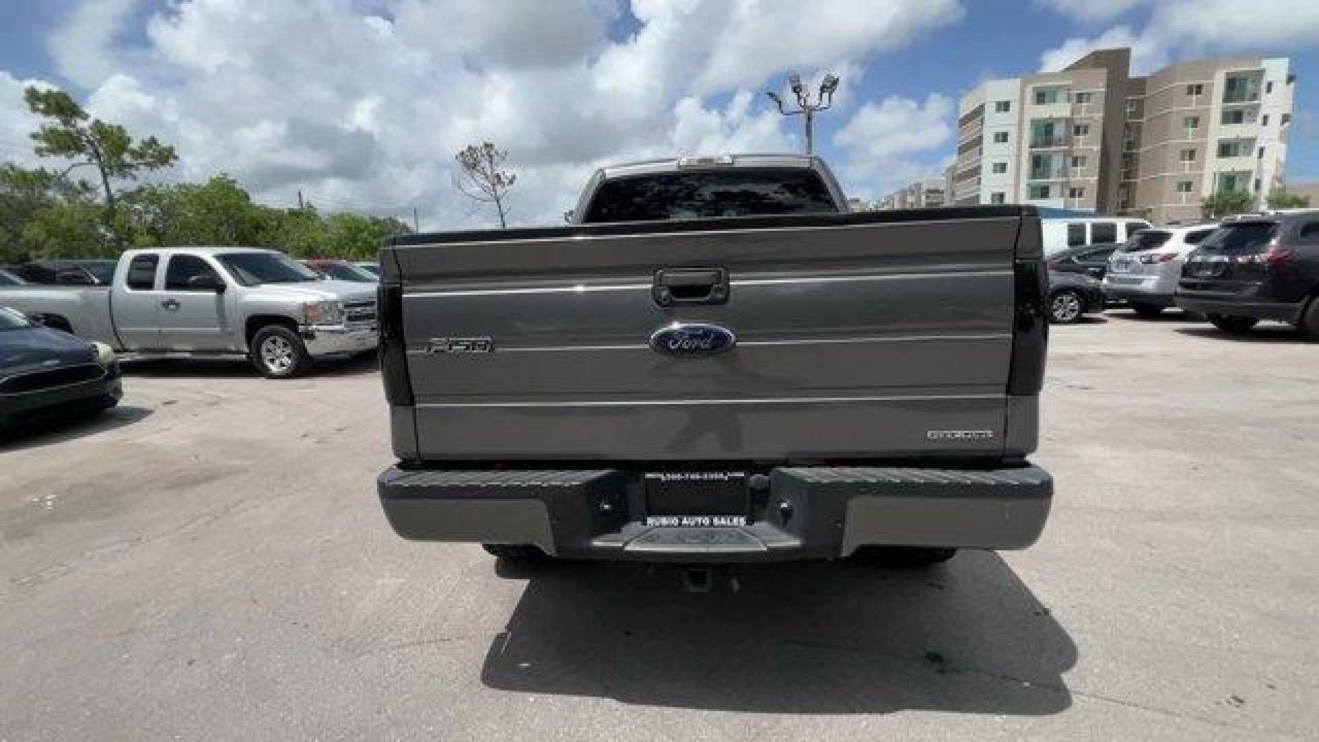 2013 Gray Ford F-150 (1FTEX1CM2DF) with an 6 3.7L engine, Automatic transmission, located at 27610 S Dixie Hwy, Homestead, FL, 33032, (305) 749-2348, 25.510241, -80.438301 - KBB.com Brand Image Awards. Boasts 23 Highway MPG and 17 City MPG! This Ford F-150 boasts a Gas/Ethanol V6 3.7L/227 engine powering this Automatic transmission. Variable interval wipers, Under frame winch-type spare tire carrier w/safety catch and lock, Trailer sway control.* This Ford F-150 Featu - Photo#3