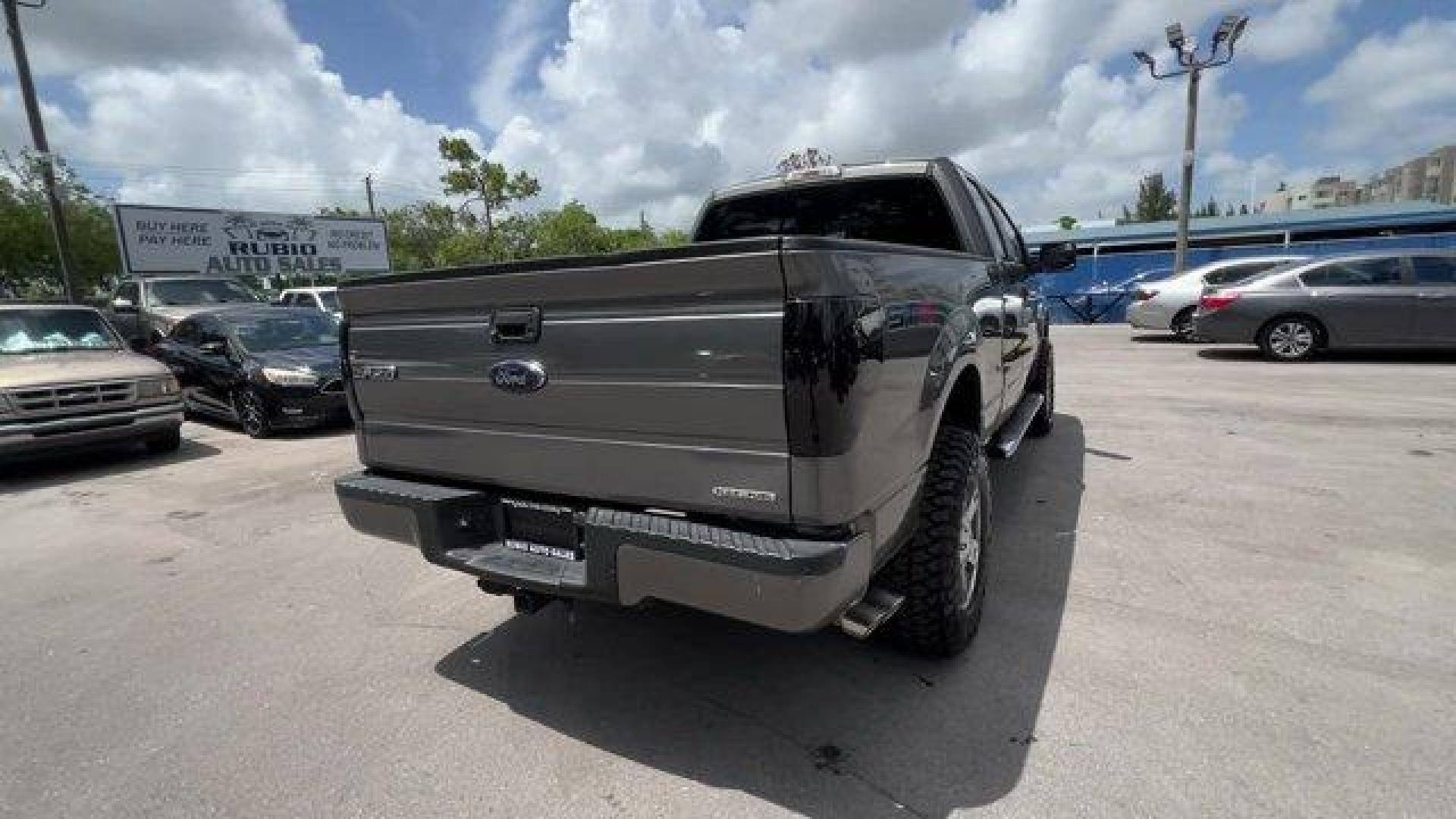 2013 Gray Ford F-150 (1FTEX1CM2DF) with an 6 3.7L engine, Automatic transmission, located at 27610 S Dixie Hwy, Homestead, FL, 33032, (305) 749-2348, 25.510241, -80.438301 - KBB.com Brand Image Awards. Boasts 23 Highway MPG and 17 City MPG! This Ford F-150 boasts a Gas/Ethanol V6 3.7L/227 engine powering this Automatic transmission. Variable interval wipers, Under frame winch-type spare tire carrier w/safety catch and lock, Trailer sway control.* This Ford F-150 Featu - Photo#4