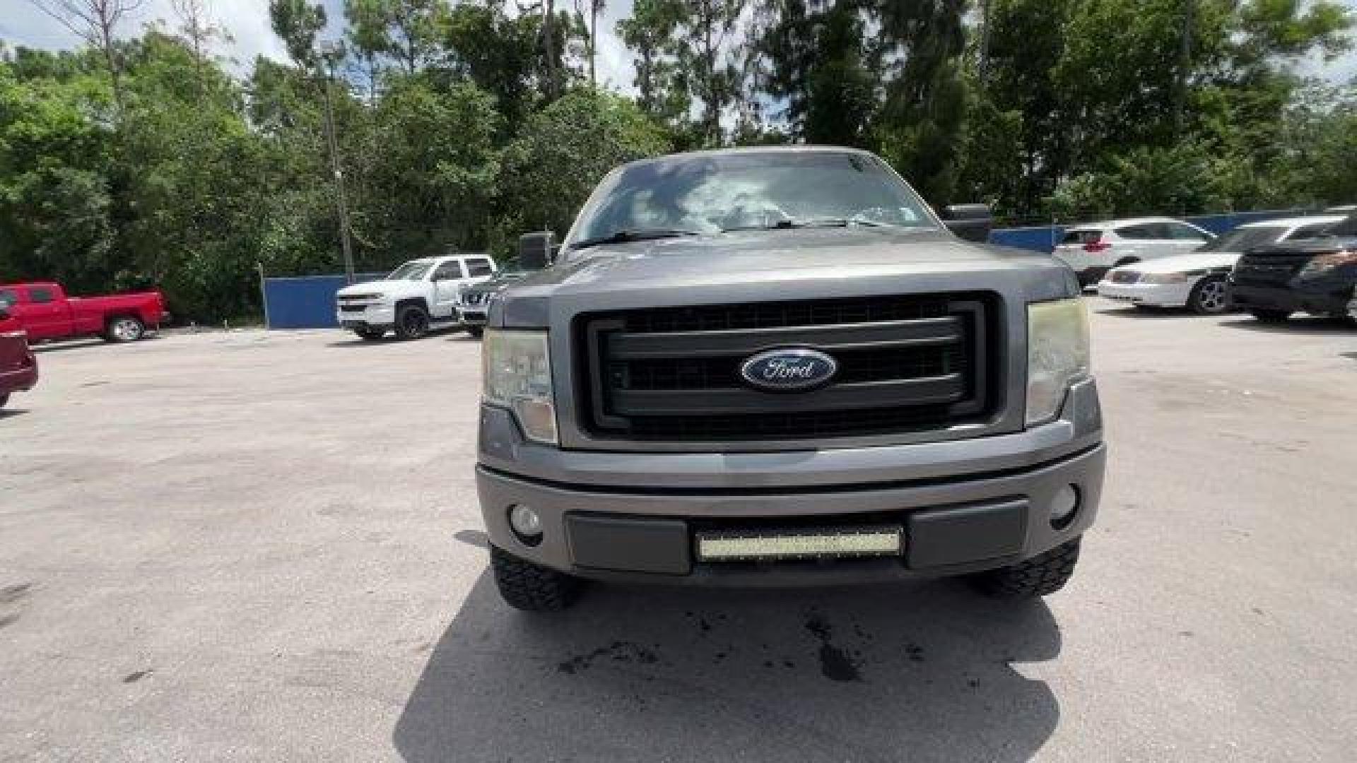 2013 Gray Ford F-150 (1FTEX1CM2DF) with an 6 3.7L engine, Automatic transmission, located at 27610 S Dixie Hwy, Homestead, FL, 33032, (305) 749-2348, 25.510241, -80.438301 - KBB.com Brand Image Awards. Boasts 23 Highway MPG and 17 City MPG! This Ford F-150 boasts a Gas/Ethanol V6 3.7L/227 engine powering this Automatic transmission. Variable interval wipers, Under frame winch-type spare tire carrier w/safety catch and lock, Trailer sway control.* This Ford F-150 Featu - Photo#7