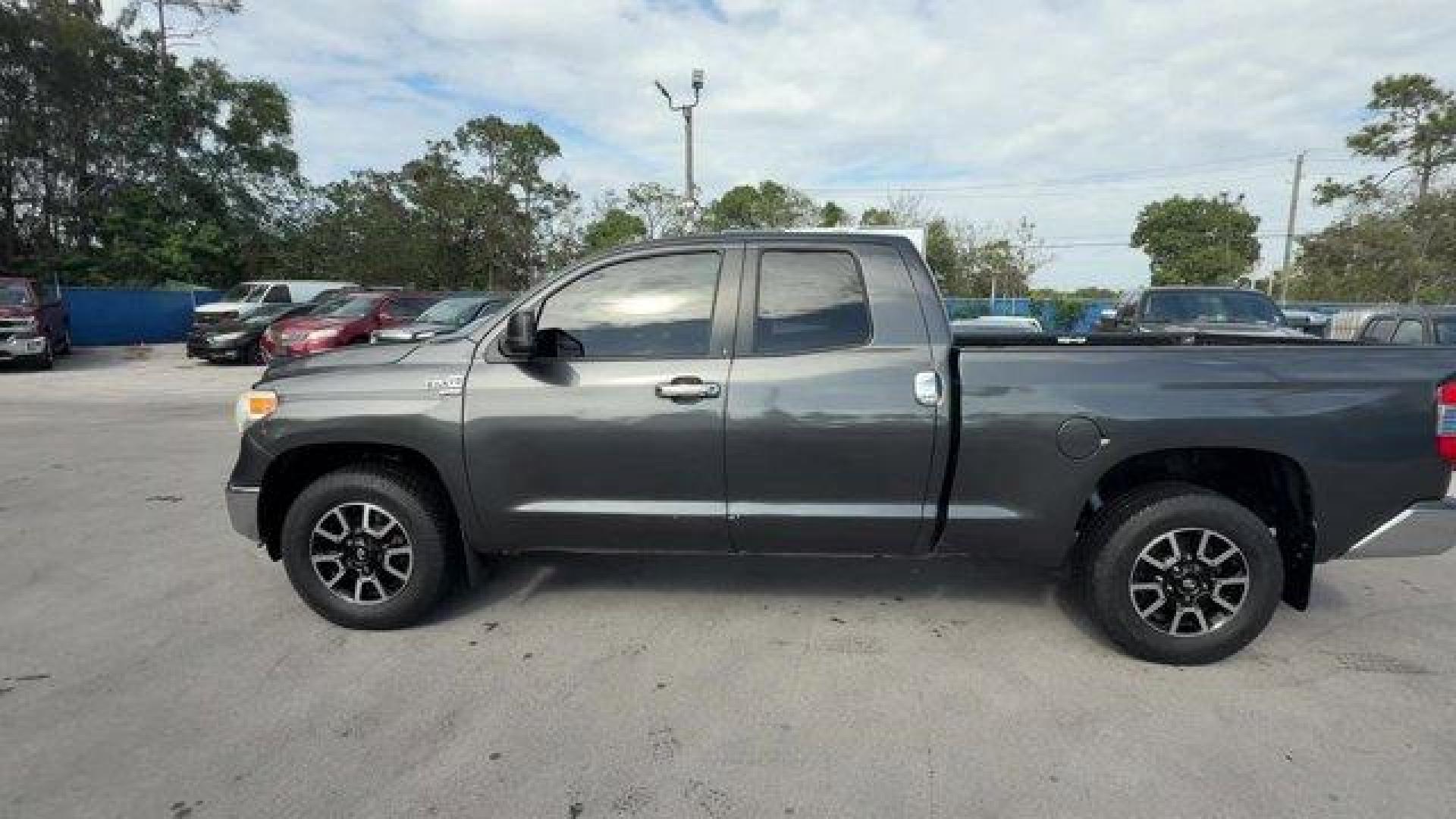 2014 Gray Toyota Tundra 2WD Truck (5TFRY5F12EX) with an 8 5.7 L engine, Automatic transmission, located at 27610 S Dixie Hwy, Homestead, FL, 33032, (305) 749-2348, 25.510241, -80.438301 - KBB.com Best Resale Value Awards. Scores 18 Highway MPG and 13 City MPG! This Toyota Tundra 2WD Truck delivers a Regular Unleaded V-8 5.7 L/346 engine powering this Automatic transmission. Wheels: 18 x 8J Styled Steel, Variable Intermittent Wipers w/Heated Wiper Park, Urethane Gear Shifter Material. - Photo#1