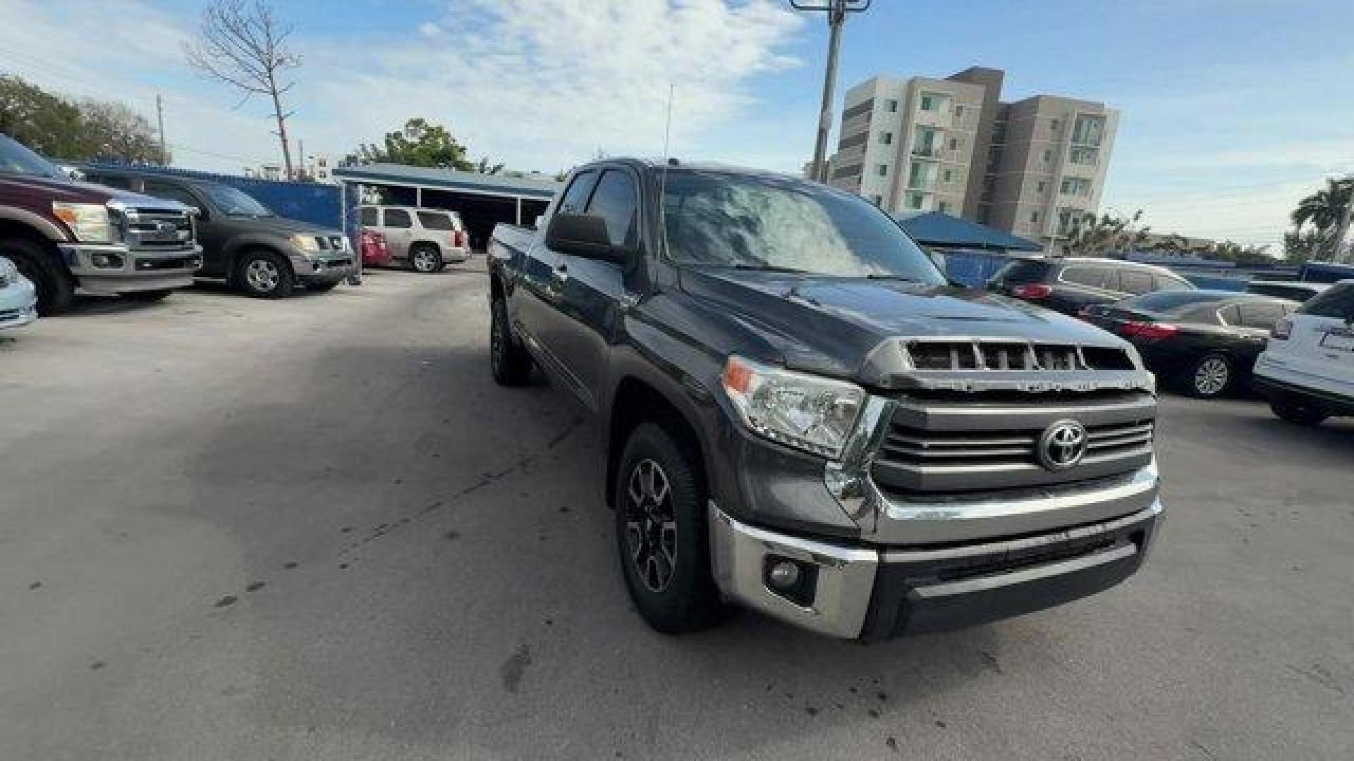 2014 Gray Toyota Tundra 2WD Truck (5TFRY5F12EX) with an 8 5.7 L engine, Automatic transmission, located at 27610 S Dixie Hwy, Homestead, FL, 33032, (305) 749-2348, 25.510241, -80.438301 - KBB.com Best Resale Value Awards. Scores 18 Highway MPG and 13 City MPG! This Toyota Tundra 2WD Truck delivers a Regular Unleaded V-8 5.7 L/346 engine powering this Automatic transmission. Wheels: 18 x 8J Styled Steel, Variable Intermittent Wipers w/Heated Wiper Park, Urethane Gear Shifter Material. - Photo#6