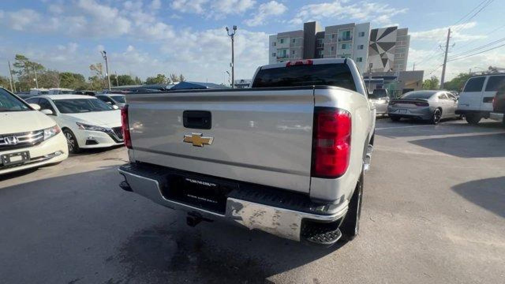 2014 Silver Ice Metallic /Jet Black Chevrolet Silverado 1500 LT (1GCRCREC8EZ) with an 8 5.3L engine, Automatic transmission, located at 27610 S Dixie Hwy, Homestead, FL, 33032, (305) 749-2348, 25.510241, -80.438301 - NACTOY 2014 North American Truck of the Year. Delivers 23 Highway MPG and 16 City MPG! This Chevrolet Silverado 1500 delivers a Gas/Ethanol V8 5.3L/325 engine powering this Automatic transmission. WHEELS, 18 X 8.5 (45.7 CM X 21.6 CM) BRIGHT-MACHINED ALUMINUM, TRANSMISSION, 6-SPEED AUTOMATIC, ELECTRO - Photo#4