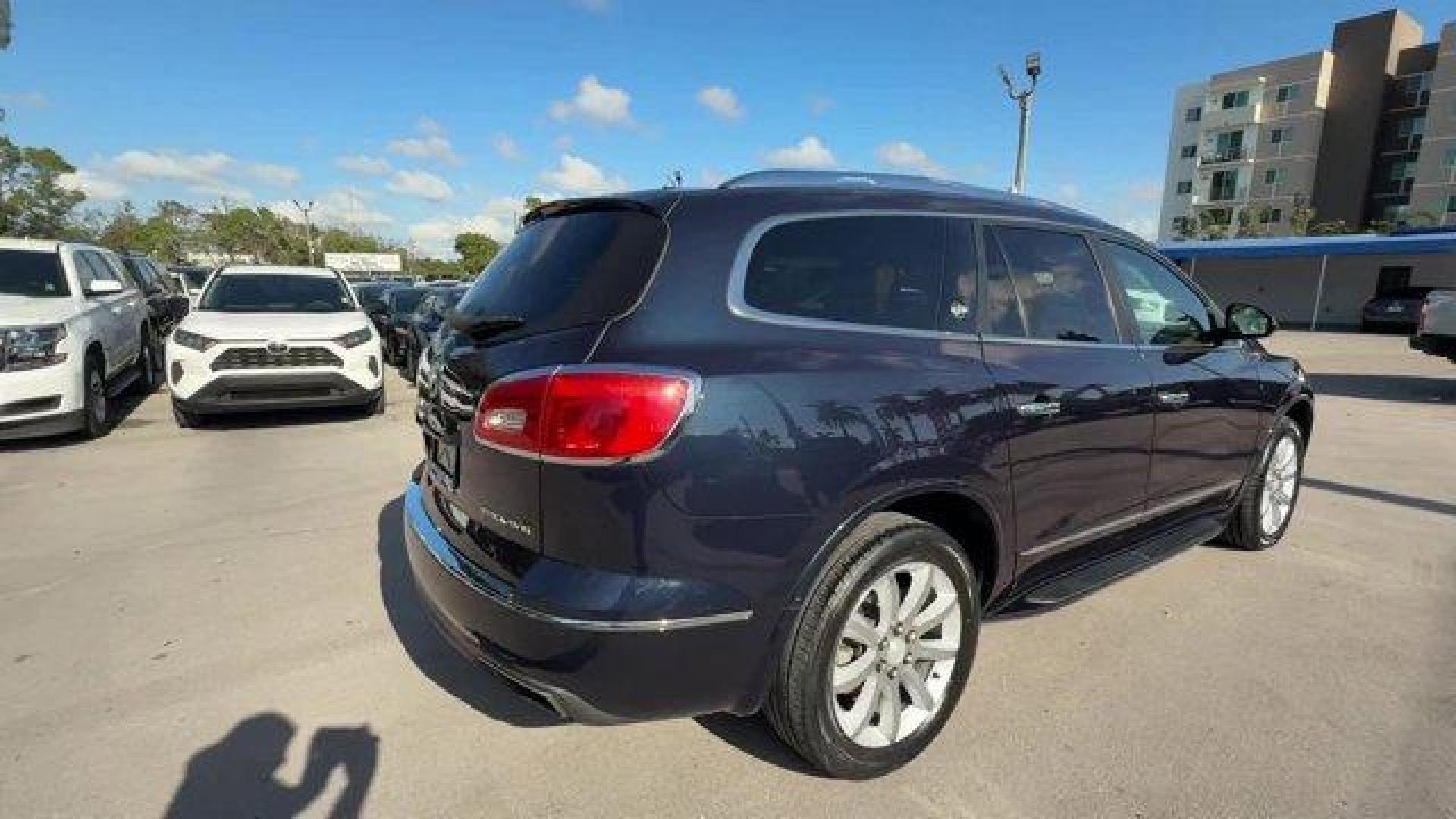 2015 Dark Sapphire Blue Metallic /Choccachino Buick Enclave Premium Group (5GAKRCKD3FJ) with an 6 3.6L engine, Automatic transmission, located at 27610 S Dixie Hwy, Homestead, FL, 33032, (305) 749-2348, 25.510241, -80.438301 - KBB.com 5-Year Cost to Own Awards. Scores 24 Highway MPG and 17 City MPG! This Buick Enclave delivers a Gas V6 3.6L/217 engine powering this Automatic transmission. WHEELS, 20 (50.8 CM) ULTRA BRIGHT BLADE SILVER MACHINED PAINTED ALUMINUM, TRANSMISSION, 6- SPEED AUTOMATIC, ELECTRONICALLY CONTROLLED W - Photo#3