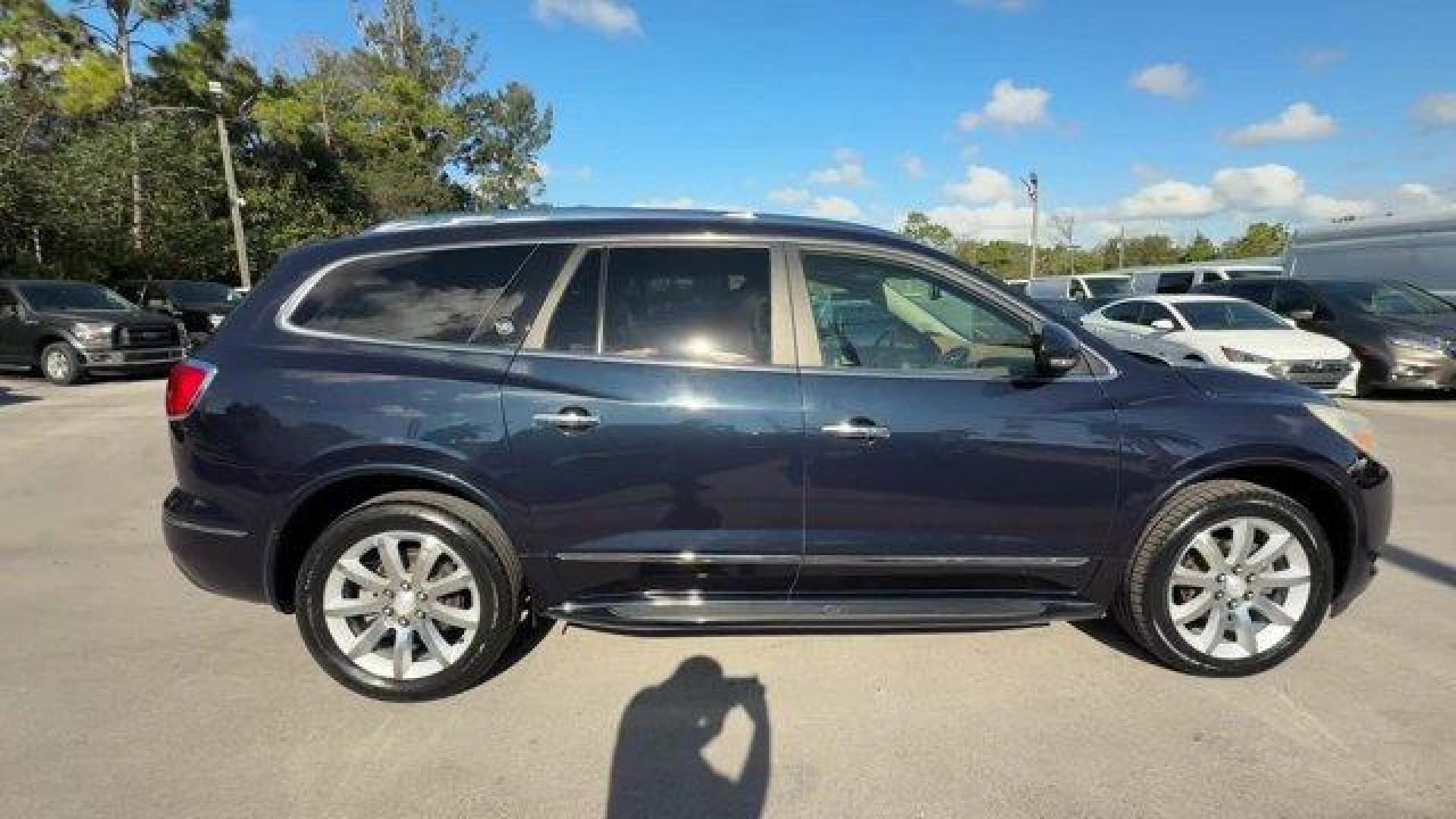 2015 Dark Sapphire Blue Metallic /Choccachino Buick Enclave Premium Group (5GAKRCKD3FJ) with an 6 3.6L engine, Automatic transmission, located at 27610 S Dixie Hwy, Homestead, FL, 33032, (305) 749-2348, 25.510241, -80.438301 - KBB.com 5-Year Cost to Own Awards. Scores 24 Highway MPG and 17 City MPG! This Buick Enclave delivers a Gas V6 3.6L/217 engine powering this Automatic transmission. WHEELS, 20 (50.8 CM) ULTRA BRIGHT BLADE SILVER MACHINED PAINTED ALUMINUM, TRANSMISSION, 6- SPEED AUTOMATIC, ELECTRONICALLY CONTROLLED W - Photo#4