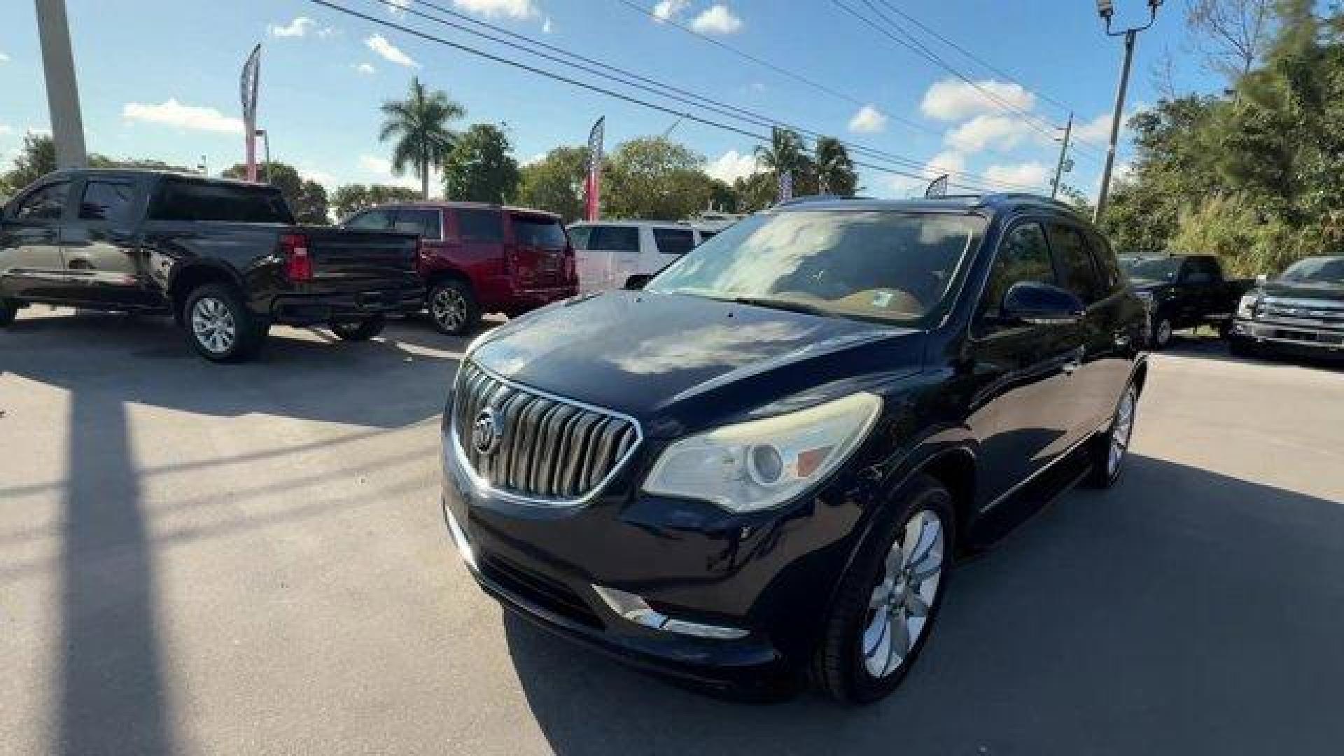 2015 Dark Sapphire Blue Metallic /Choccachino Buick Enclave Premium Group (5GAKRCKD3FJ) with an 6 3.6L engine, Automatic transmission, located at 27610 S Dixie Hwy, Homestead, FL, 33032, (305) 749-2348, 25.510241, -80.438301 - KBB.com 5-Year Cost to Own Awards. Scores 24 Highway MPG and 17 City MPG! This Buick Enclave delivers a Gas V6 3.6L/217 engine powering this Automatic transmission. WHEELS, 20 (50.8 CM) ULTRA BRIGHT BLADE SILVER MACHINED PAINTED ALUMINUM, TRANSMISSION, 6- SPEED AUTOMATIC, ELECTRONICALLY CONTROLLED W - Photo#7