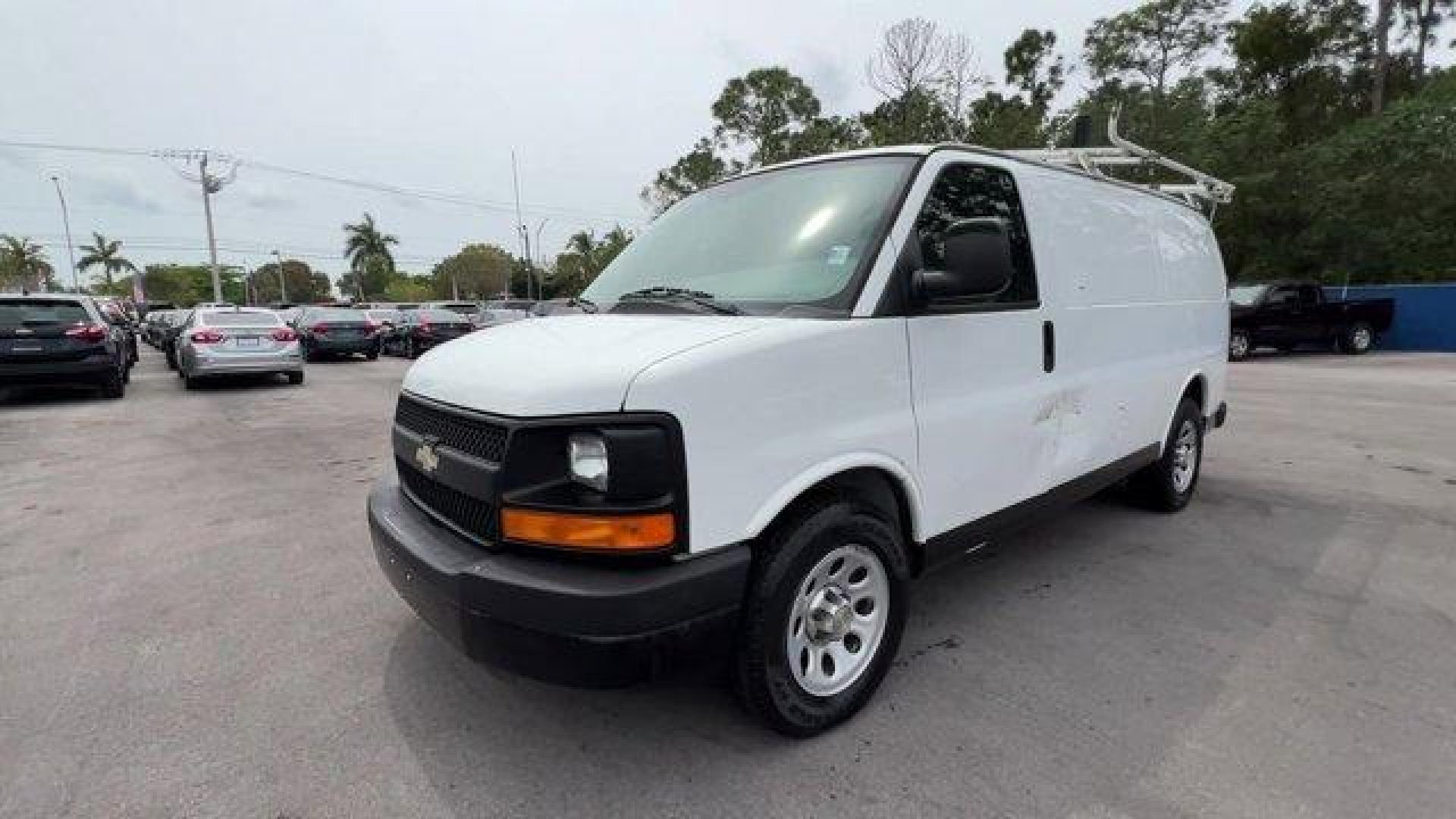 2014 Summit White /Medium Pewter Chevrolet Express Cargo Van Work Van (1GCSGAFX6E1) with an 6 4.3L engine, Automatic transmission, located at 27610 S Dixie Hwy, Homestead, FL, 33032, (305) 749-2348, 25.510241, -80.438301 - KBB.com Brand Image Awards. Boasts 19 Highway MPG and 14 City MPG! This Chevrolet Express Cargo Van boasts a Gas V6 4.3L/262 engine powering this Automatic transmission. WINDOWS, POWER, DELETE, TRANSMISSION, 4-SPEED AUTOMATIC, ELECTRONICALLY CONTROLLED with overdrive, tow/haul mode and internal tran - Photo#0