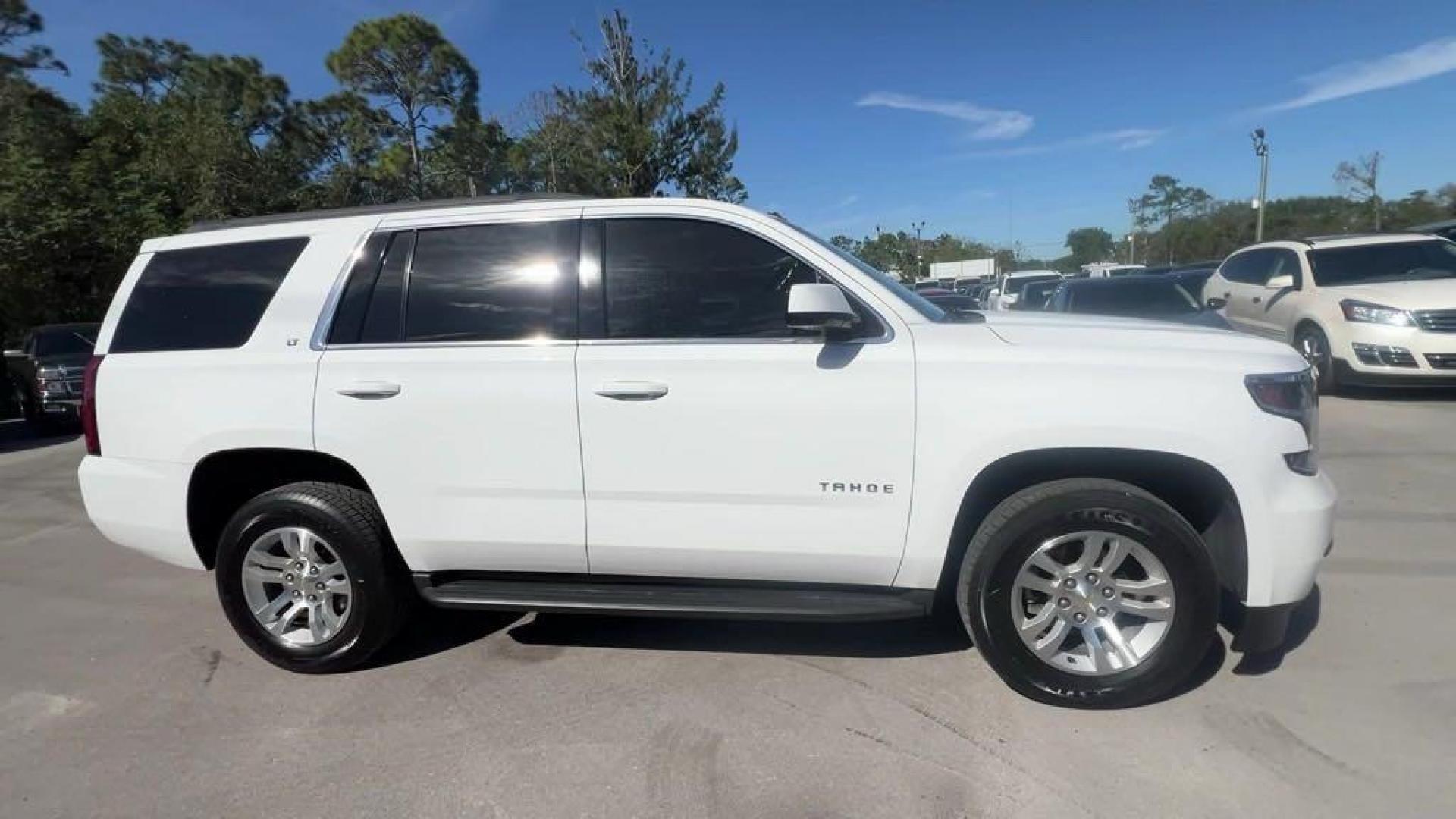 2015 Summit White /Jet Black/Dark Ash Chevrolet Tahoe LT (1GNSKBKC6FR) with an EcoTec3 5.3L V8 engine, Automatic transmission, located at 27610 S Dixie Hwy, Homestead, FL, 33032, (305) 749-2348, 25.510241, -80.438301 - Photo#5