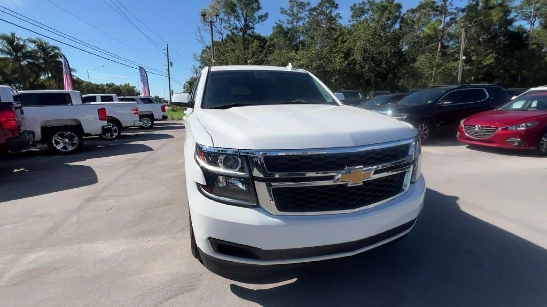 2015 Summit White /Jet Black/Dark Ash Chevrolet Tahoe LT (1GNSKBKC6FR) with an EcoTec3 5.3L V8 engine, Automatic transmission, located at 27610 S Dixie Hwy, Homestead, FL, 33032, (305) 749-2348, 25.510241, -80.438301 - Photo#7