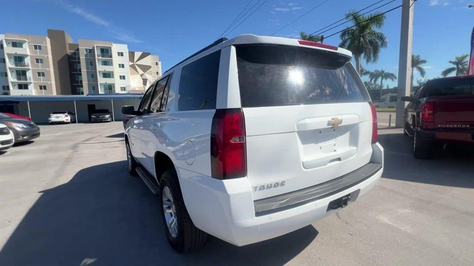 2015 Summit White /Jet Black/Dark Ash Chevrolet Tahoe LT (1GNSKBKC6FR) with an EcoTec3 5.3L V8 engine, Automatic transmission, located at 27610 S Dixie Hwy, Homestead, FL, 33032, (305) 749-2348, 25.510241, -80.438301 - Photo#2