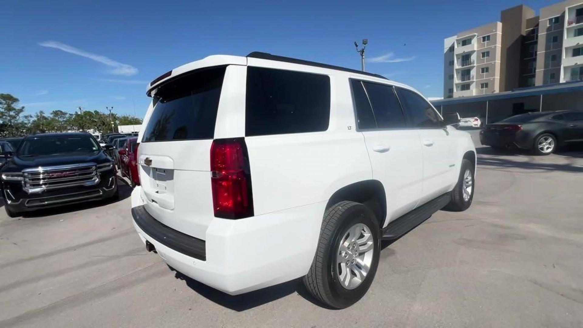 2015 Summit White /Jet Black/Dark Ash Chevrolet Tahoe LT (1GNSKBKC6FR) with an EcoTec3 5.3L V8 engine, Automatic transmission, located at 27610 S Dixie Hwy, Homestead, FL, 33032, (305) 749-2348, 25.510241, -80.438301 - Photo#4