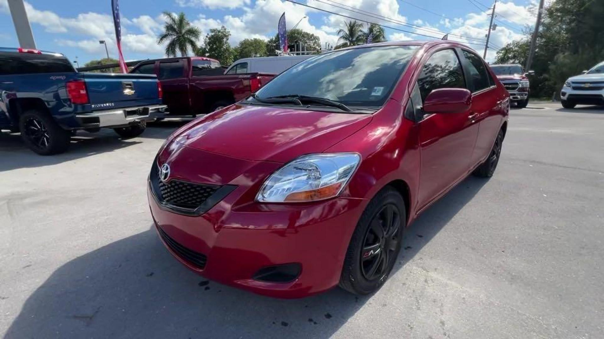 2011 Barcelona Red Metallic Toyota Yaris Base (JTDBT4K37B1) with an 1.5L I4 DOHC VVT-i 16V engine, Automatic transmission, located at 27610 S Dixie Hwy, Homestead, FL, 33032, (305) 749-2348, 25.510241, -80.438301 - Photo#0
