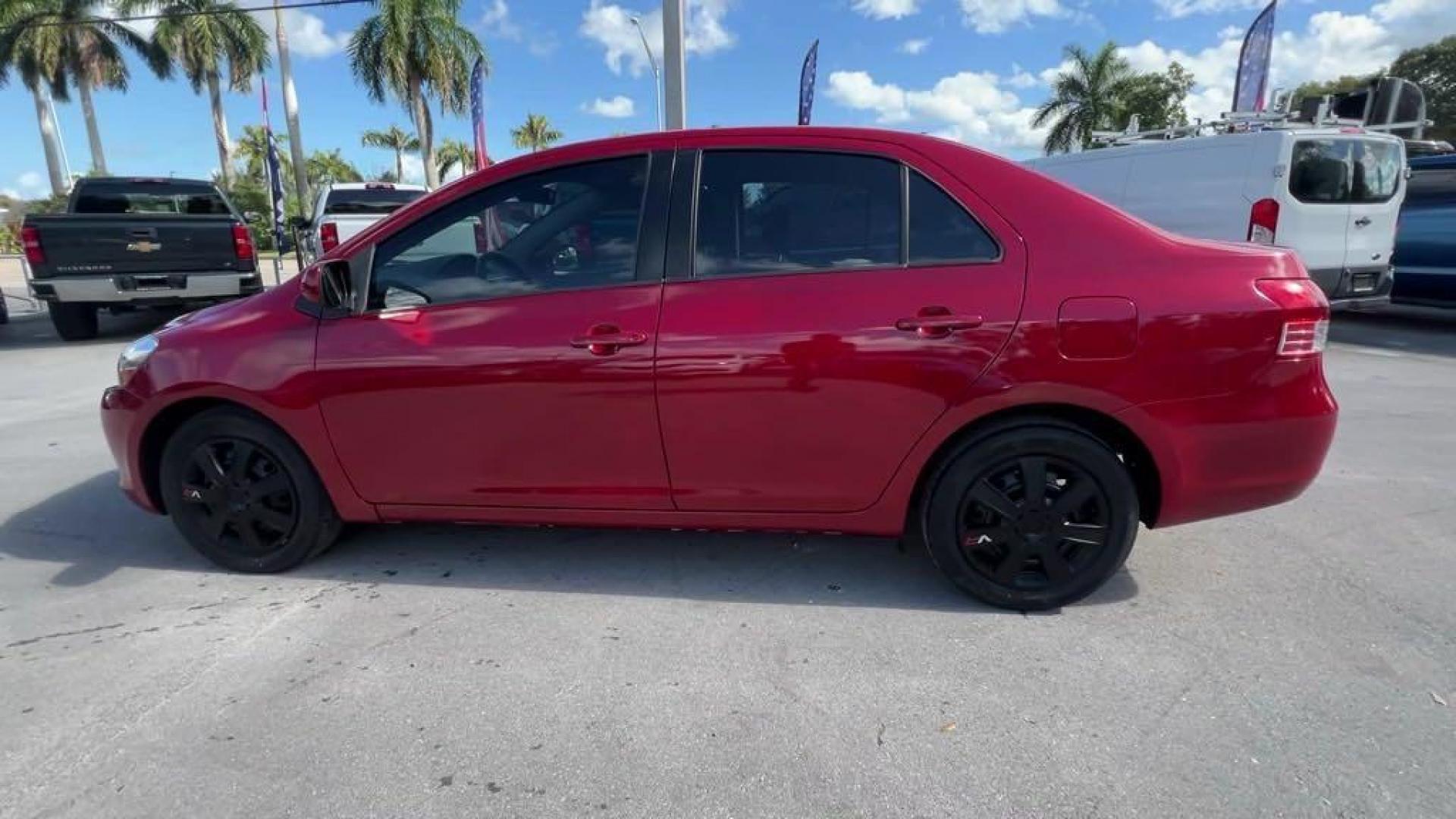 2011 Barcelona Red Metallic Toyota Yaris Base (JTDBT4K37B1) with an 1.5L I4 DOHC VVT-i 16V engine, Automatic transmission, located at 27610 S Dixie Hwy, Homestead, FL, 33032, (305) 749-2348, 25.510241, -80.438301 - Photo#1
