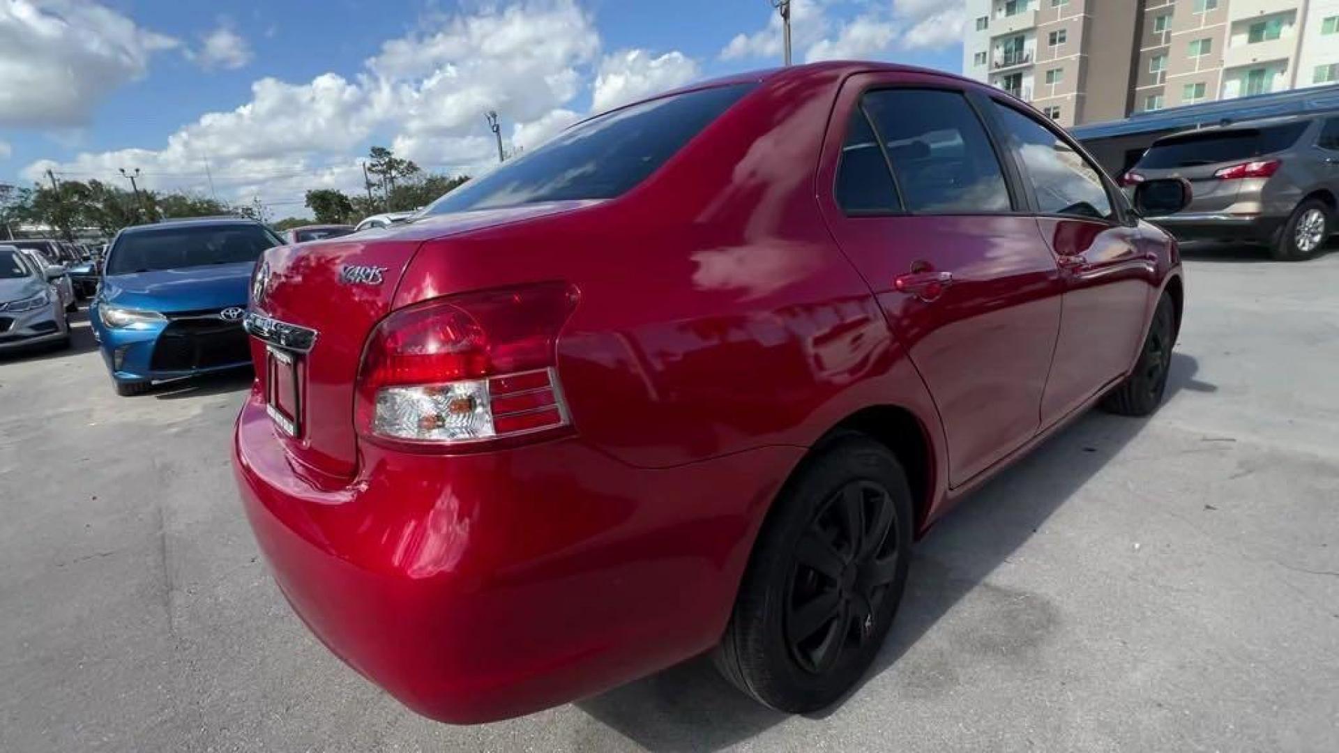2011 Barcelona Red Metallic Toyota Yaris Base (JTDBT4K37B1) with an 1.5L I4 DOHC VVT-i 16V engine, Automatic transmission, located at 27610 S Dixie Hwy, Homestead, FL, 33032, (305) 749-2348, 25.510241, -80.438301 - Photo#4