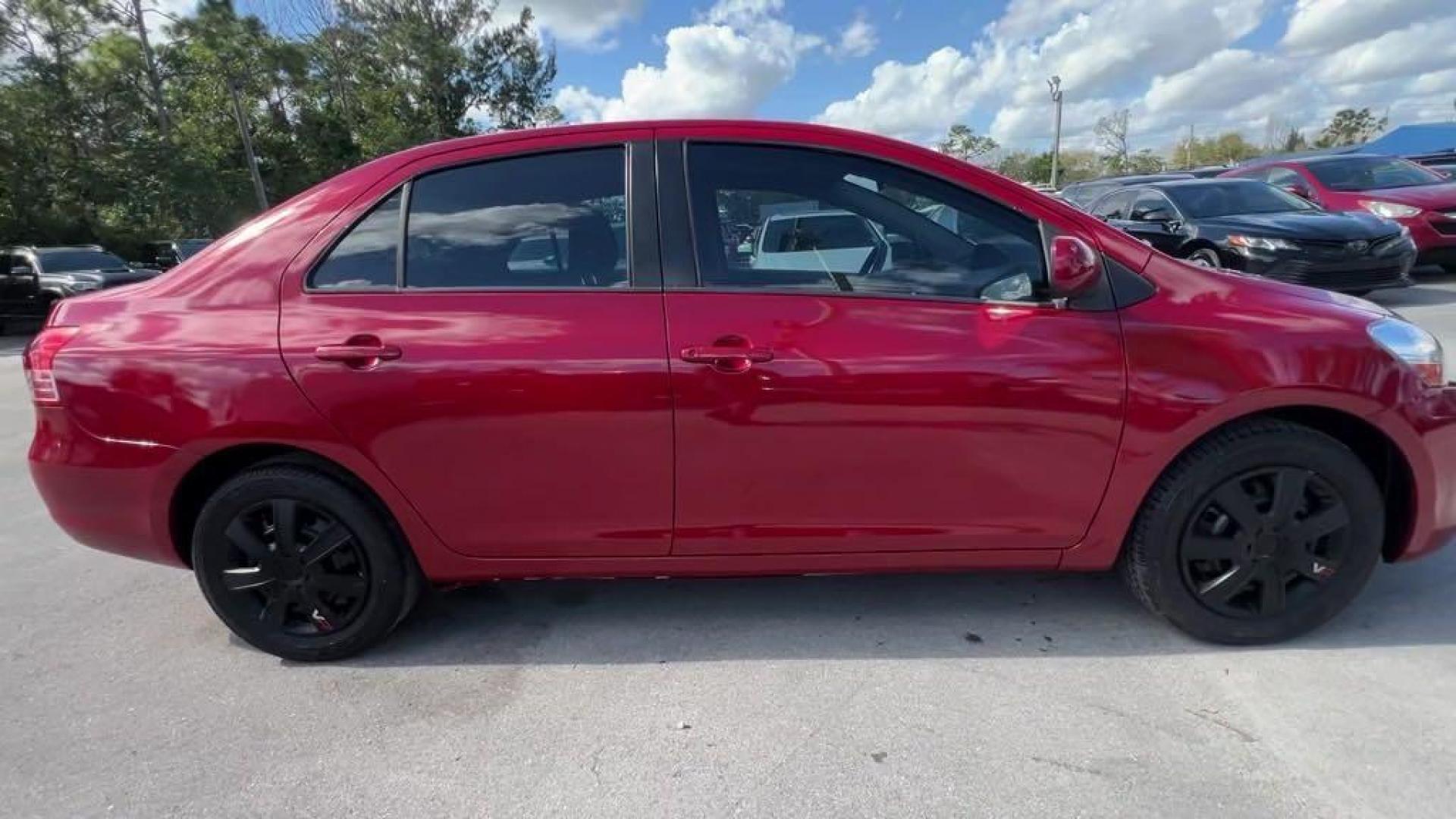 2011 Barcelona Red Metallic Toyota Yaris Base (JTDBT4K37B1) with an 1.5L I4 DOHC VVT-i 16V engine, Automatic transmission, located at 27610 S Dixie Hwy, Homestead, FL, 33032, (305) 749-2348, 25.510241, -80.438301 - Photo#5