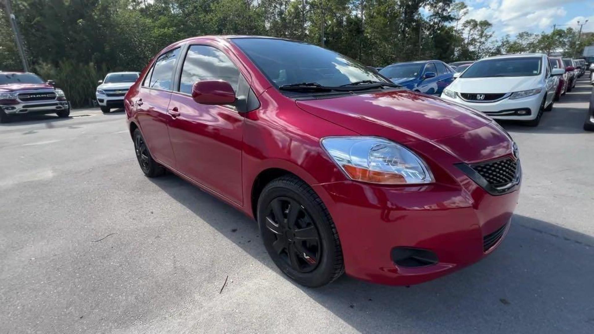2011 Barcelona Red Metallic Toyota Yaris Base (JTDBT4K37B1) with an 1.5L I4 DOHC VVT-i 16V engine, Automatic transmission, located at 27610 S Dixie Hwy, Homestead, FL, 33032, (305) 749-2348, 25.510241, -80.438301 - Photo#6