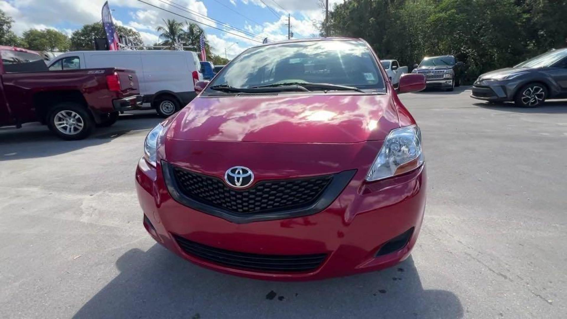 2011 Barcelona Red Metallic Toyota Yaris Base (JTDBT4K37B1) with an 1.5L I4 DOHC VVT-i 16V engine, Automatic transmission, located at 27610 S Dixie Hwy, Homestead, FL, 33032, (305) 749-2348, 25.510241, -80.438301 - Photo#7