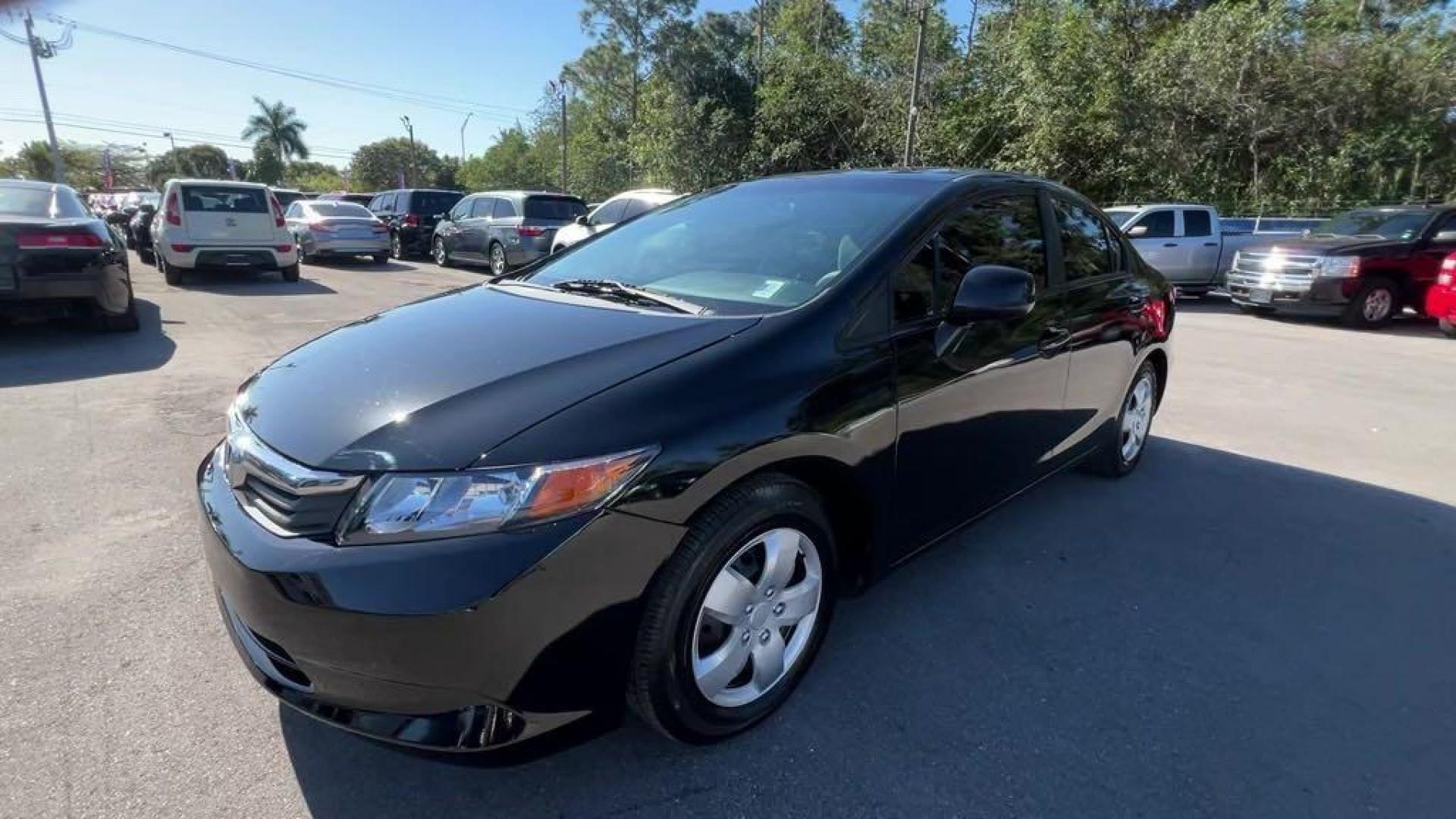 2012 Crystal Black Pearl Honda Civic LX (19XFB2F57CE) with an 1.8L I4 SOHC 16V i-VTEC engine, Automatic transmission, located at 27610 S Dixie Hwy, Homestead, FL, 33032, (305) 749-2348, 25.510241, -80.438301 - Photo#0