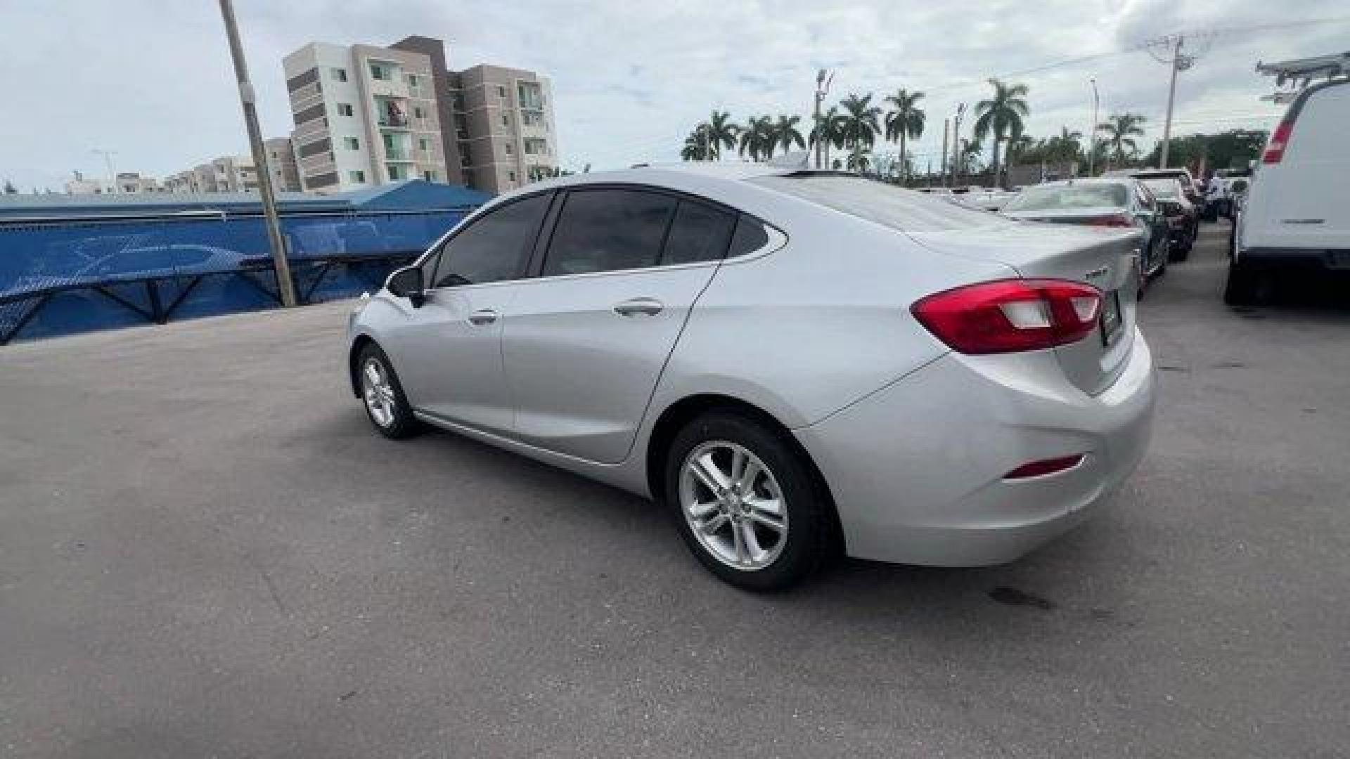 2018 Silver Ice Metallic /Jet Black Chevrolet Cruze LT (1G1BE5SM3J7) with an 4 1.4L engine, Automatic transmission, located at 27610 S Dixie Hwy, Homestead, FL, 33032, (305) 749-2348, 25.510241, -80.438301 - KBB.com 10 Most Awarded Brands. Delivers 40 Highway MPG and 29 City MPG! This Chevrolet Cruze delivers a Turbocharged Gas I4 1.4L/ engine powering this Automatic transmission. WHEELS, 16 (40.6 CM) ALUMINUM (STD), TRANSMISSION, 6-SPEED AUTOMATIC (STD), TIRES, 205/55R16 ALL-SEASON, BLACKWALL.* This Ch - Photo#2