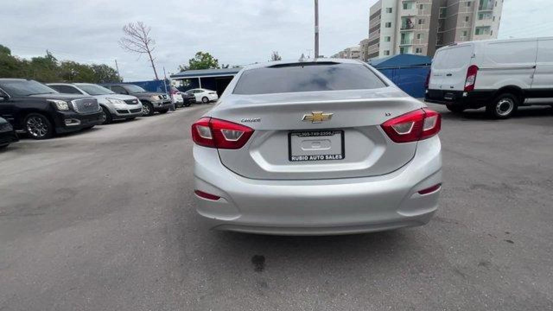 2018 Silver Ice Metallic /Jet Black Chevrolet Cruze LT (1G1BE5SM3J7) with an 4 1.4L engine, Automatic transmission, located at 27610 S Dixie Hwy, Homestead, FL, 33032, (305) 749-2348, 25.510241, -80.438301 - KBB.com 10 Most Awarded Brands. Delivers 40 Highway MPG and 29 City MPG! This Chevrolet Cruze delivers a Turbocharged Gas I4 1.4L/ engine powering this Automatic transmission. WHEELS, 16 (40.6 CM) ALUMINUM (STD), TRANSMISSION, 6-SPEED AUTOMATIC (STD), TIRES, 205/55R16 ALL-SEASON, BLACKWALL.* This Ch - Photo#3