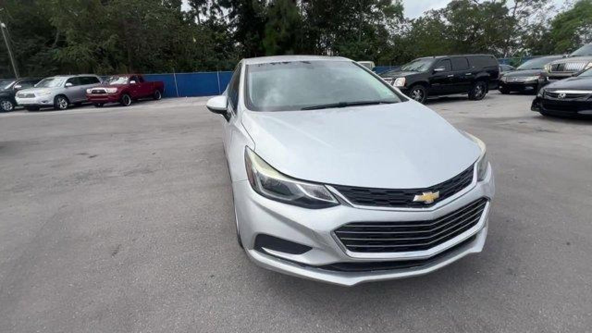 2018 Silver Ice Metallic /Jet Black Chevrolet Cruze LT (1G1BE5SM3J7) with an 4 1.4L engine, Automatic transmission, located at 27610 S Dixie Hwy, Homestead, FL, 33032, (305) 749-2348, 25.510241, -80.438301 - KBB.com 10 Most Awarded Brands. Delivers 40 Highway MPG and 29 City MPG! This Chevrolet Cruze delivers a Turbocharged Gas I4 1.4L/ engine powering this Automatic transmission. WHEELS, 16 (40.6 CM) ALUMINUM (STD), TRANSMISSION, 6-SPEED AUTOMATIC (STD), TIRES, 205/55R16 ALL-SEASON, BLACKWALL.* This Ch - Photo#7