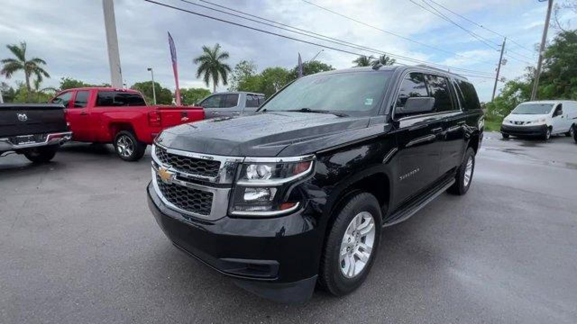 2019 Black /Jet Black/Dark Ash Chevrolet Suburban LT (1GNSCHKC5KR) with an 8 5.3L engine, Automatic transmission, located at 27610 S Dixie Hwy, Homestead, FL, 33032, (305) 749-2348, 25.510241, -80.438301 - Delivers 22 Highway MPG and 15 City MPG! This Chevrolet Suburban delivers a Gas/Ethanol V8 5.3L/ engine powering this Automatic transmission. WHEELS, 18 X 8.5 (45.7 CM X 21.6 CM) ALUMINUM WITH HIGH-POLISHED FINISH (STD), TRANSMISSION, 6-SPEED AUTOMATIC, ELECTRONICALLY CONTROLLED with overdrive and t - Photo#0