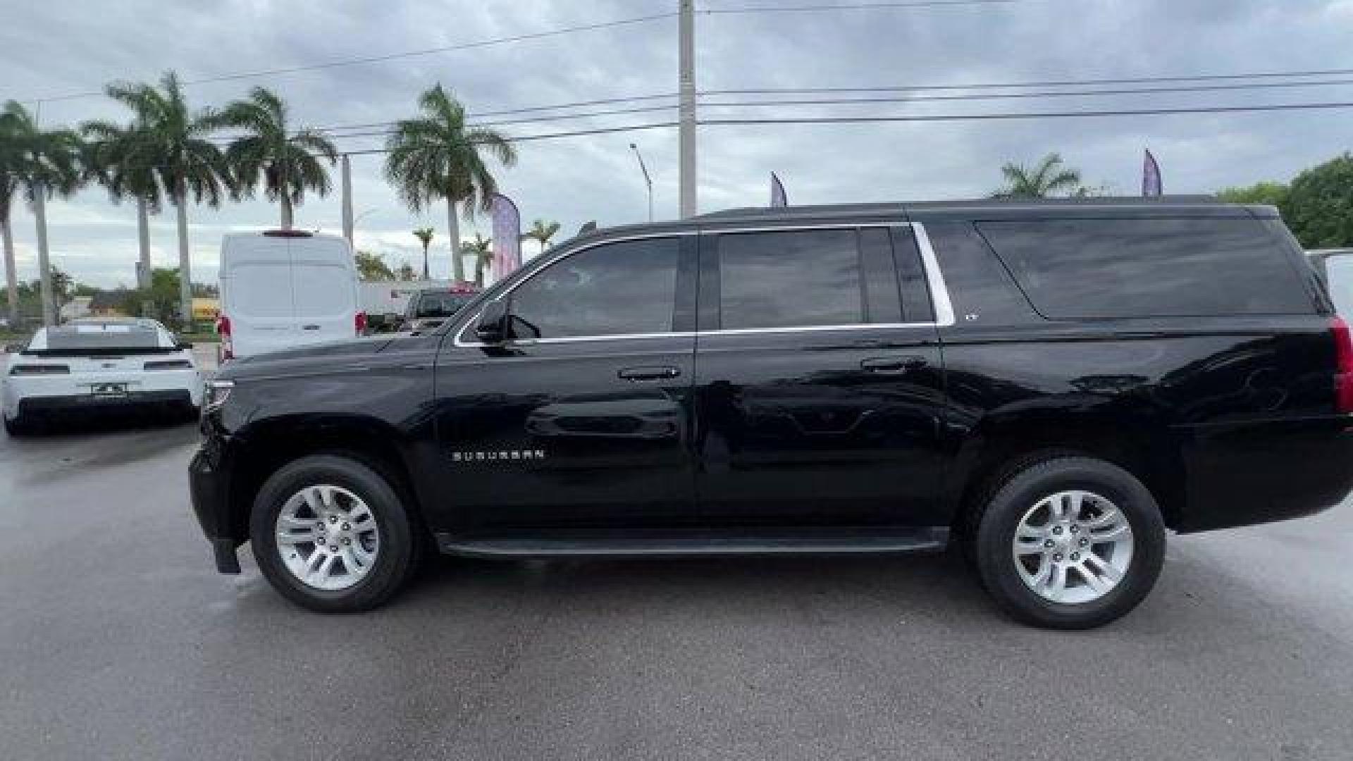 2019 Black /Jet Black/Dark Ash Chevrolet Suburban LT (1GNSCHKC5KR) with an 8 5.3L engine, Automatic transmission, located at 27610 S Dixie Hwy, Homestead, FL, 33032, (305) 749-2348, 25.510241, -80.438301 - Delivers 22 Highway MPG and 15 City MPG! This Chevrolet Suburban delivers a Gas/Ethanol V8 5.3L/ engine powering this Automatic transmission. WHEELS, 18 X 8.5 (45.7 CM X 21.6 CM) ALUMINUM WITH HIGH-POLISHED FINISH (STD), TRANSMISSION, 6-SPEED AUTOMATIC, ELECTRONICALLY CONTROLLED with overdrive and t - Photo#1