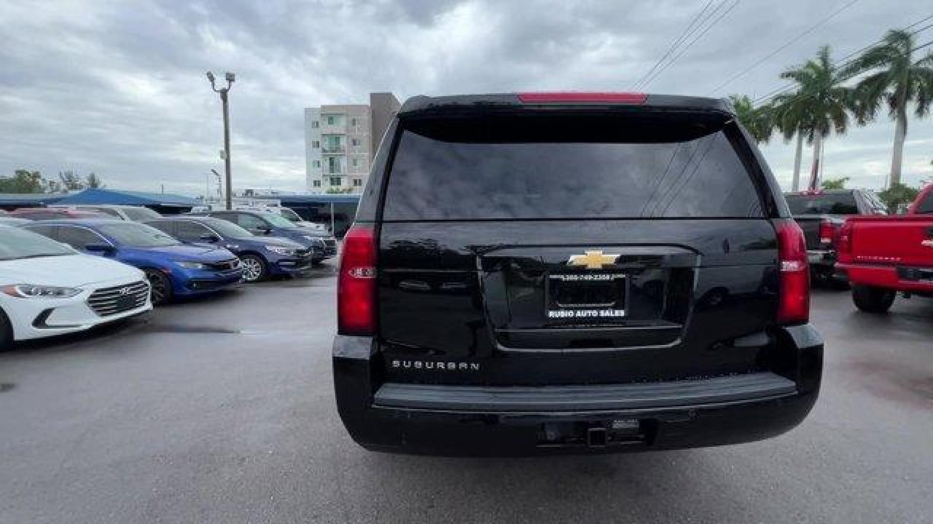 2019 Black /Jet Black/Dark Ash Chevrolet Suburban LT (1GNSCHKC5KR) with an 8 5.3L engine, Automatic transmission, located at 27610 S Dixie Hwy, Homestead, FL, 33032, (305) 749-2348, 25.510241, -80.438301 - Delivers 22 Highway MPG and 15 City MPG! This Chevrolet Suburban delivers a Gas/Ethanol V8 5.3L/ engine powering this Automatic transmission. WHEELS, 18 X 8.5 (45.7 CM X 21.6 CM) ALUMINUM WITH HIGH-POLISHED FINISH (STD), TRANSMISSION, 6-SPEED AUTOMATIC, ELECTRONICALLY CONTROLLED with overdrive and t - Photo#3