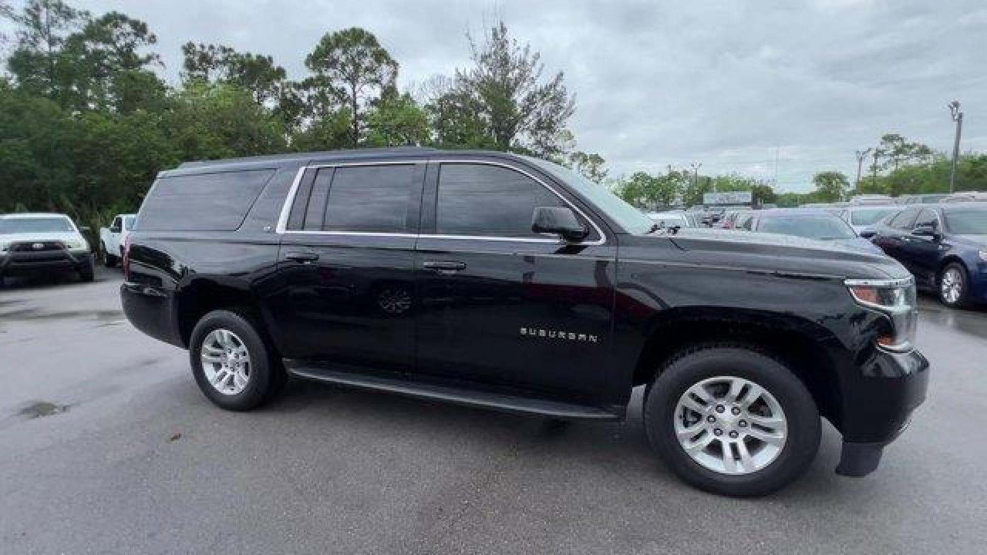 2019 Black /Jet Black/Dark Ash Chevrolet Suburban LT (1GNSCHKC5KR) with an 8 5.3L engine, Automatic transmission, located at 27610 S Dixie Hwy, Homestead, FL, 33032, (305) 749-2348, 25.510241, -80.438301 - Delivers 22 Highway MPG and 15 City MPG! This Chevrolet Suburban delivers a Gas/Ethanol V8 5.3L/ engine powering this Automatic transmission. WHEELS, 18 X 8.5 (45.7 CM X 21.6 CM) ALUMINUM WITH HIGH-POLISHED FINISH (STD), TRANSMISSION, 6-SPEED AUTOMATIC, ELECTRONICALLY CONTROLLED with overdrive and t - Photo#5