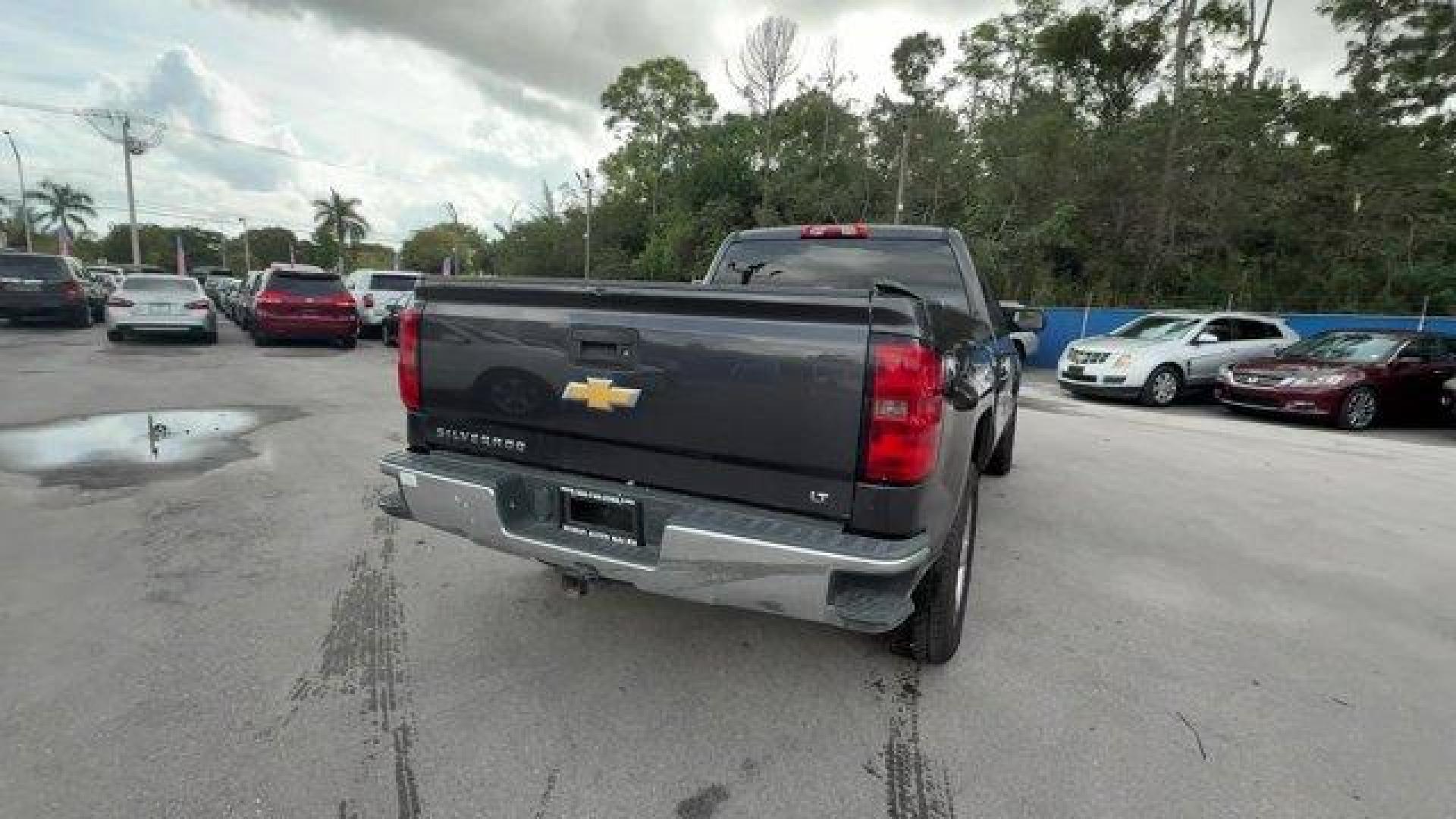 2014 Tungsten Metallic /Jet Black Chevrolet Silverado 1500 (1GCRCREH8EZ) with an 6 4.3L engine, Automatic transmission, located at 27610 S Dixie Hwy, Homestead, FL, 33032, (305) 749-2348, 25.510241, -80.438301 - NACTOY 2014 North American Truck of the Year. Boasts 24 Highway MPG and 18 City MPG! This Chevrolet Silverado 1500 boasts a Gas/Ethanol V6 4.3L/262 engine powering this Automatic transmission. WHEELS, 20 X 9 (50.8 CM X 22.9 CM) POLISHED-ALUMINUM, TUNGSTEN METALLIC, TRANSMISSION, 6-SPEED AUTOMATIC, E - Photo#4