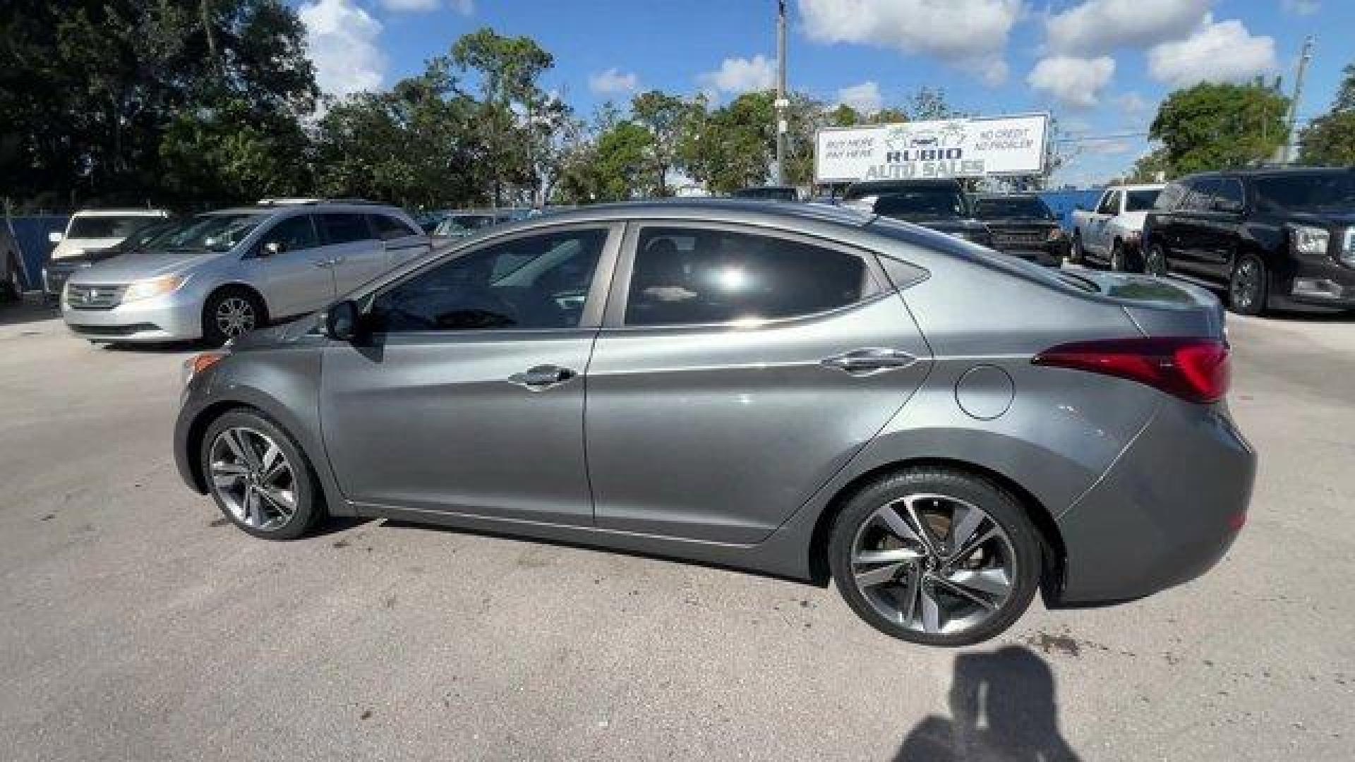 2016 Galactic Gray /Black Hyundai Elantra (KMHDH4AE5GU) with an 4 1.8 L engine, Automatic transmission, located at 27610 S Dixie Hwy, Homestead, FL, 33032, (305) 749-2348, 25.510241, -80.438301 - KBB.com Best Buy Awards Finalist. Delivers 38 Highway MPG and 28 City MPG! This Hyundai Elantra delivers a Regular Unleaded I-4 1.8 L/110 engine powering this Automatic transmission. GALACTIC GRAY, CARPETED FLOOR MATS, BLACK, LEATHER SEATING SURFACES.* This Hyundai Elantra Features the Following Opt - Photo#5