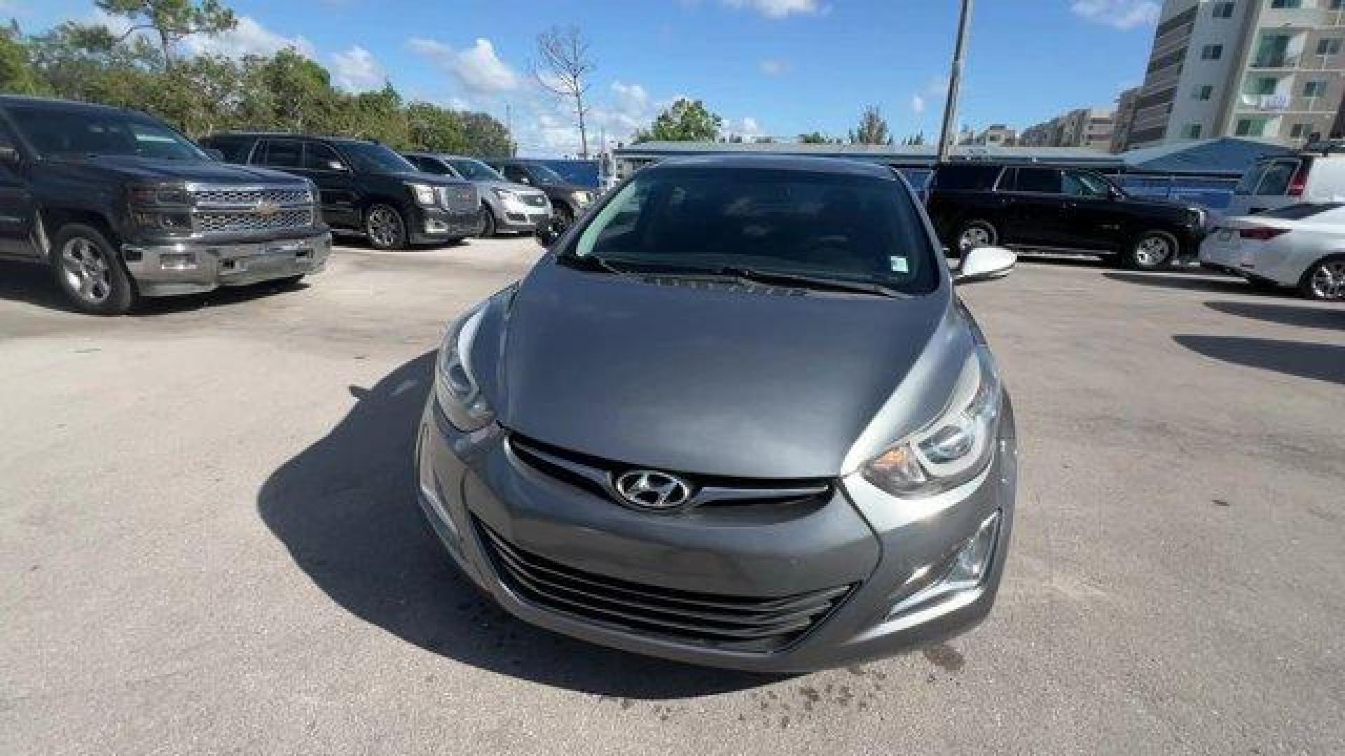 2016 Galactic Gray /Black Hyundai Elantra (KMHDH4AE5GU) with an 4 1.8 L engine, Automatic transmission, located at 27610 S Dixie Hwy, Homestead, FL, 33032, (305) 749-2348, 25.510241, -80.438301 - KBB.com Best Buy Awards Finalist. Delivers 38 Highway MPG and 28 City MPG! This Hyundai Elantra delivers a Regular Unleaded I-4 1.8 L/110 engine powering this Automatic transmission. GALACTIC GRAY, CARPETED FLOOR MATS, BLACK, LEATHER SEATING SURFACES.* This Hyundai Elantra Features the Following Opt - Photo#7