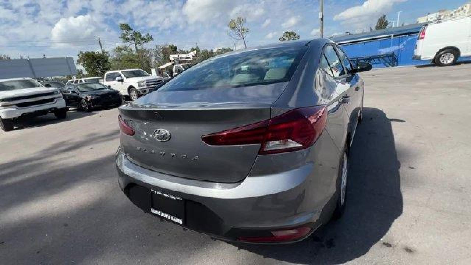 2019 Machine Gray /Gray Hyundai Elantra (5NPD74LF1KH) with an 4 2.0 L engine, Automatic transmission, located at 27610 S Dixie Hwy, Homestead, FL, 33032, (305) 749-2348, 25.510241, -80.438301 - Boasts 38 Highway MPG and 29 City MPG! This Hyundai Elantra boasts a Regular Unleaded I-4 2.0 L/122 engine powering this Automatic transmission. OPTION GROUP 01, MACHINE GRAY, GRAY, PREMIUM CLOTH SEAT TRIM.* This Hyundai Elantra Features the Following Options *CARPETED FLOOR MATS, Window Grid Antenn - Photo#4