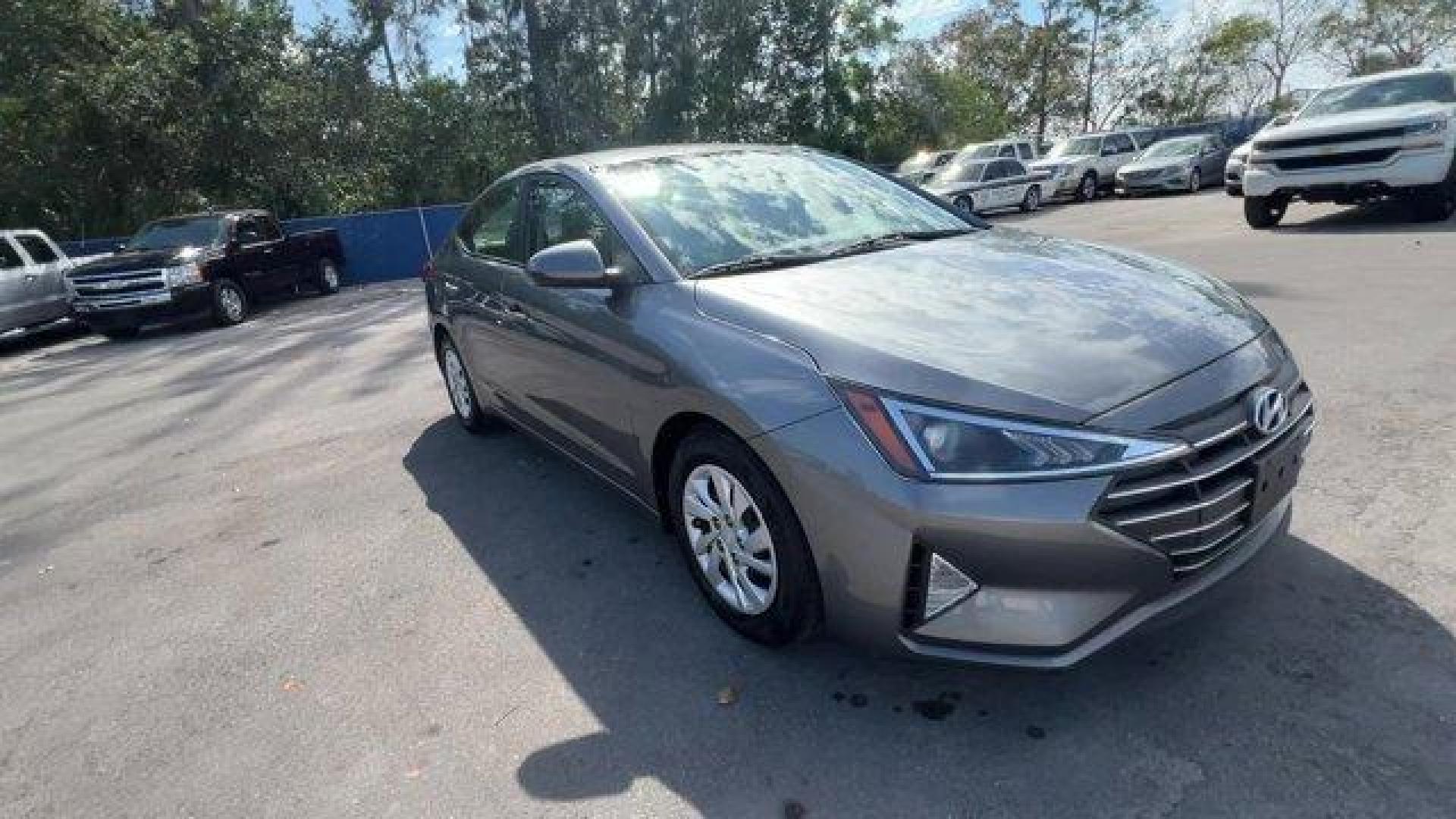 2019 Machine Gray /Gray Hyundai Elantra (5NPD74LF1KH) with an 4 2.0 L engine, Automatic transmission, located at 27610 S Dixie Hwy, Homestead, FL, 33032, (305) 749-2348, 25.510241, -80.438301 - Boasts 38 Highway MPG and 29 City MPG! This Hyundai Elantra boasts a Regular Unleaded I-4 2.0 L/122 engine powering this Automatic transmission. OPTION GROUP 01, MACHINE GRAY, GRAY, PREMIUM CLOTH SEAT TRIM.* This Hyundai Elantra Features the Following Options *CARPETED FLOOR MATS, Window Grid Antenn - Photo#6