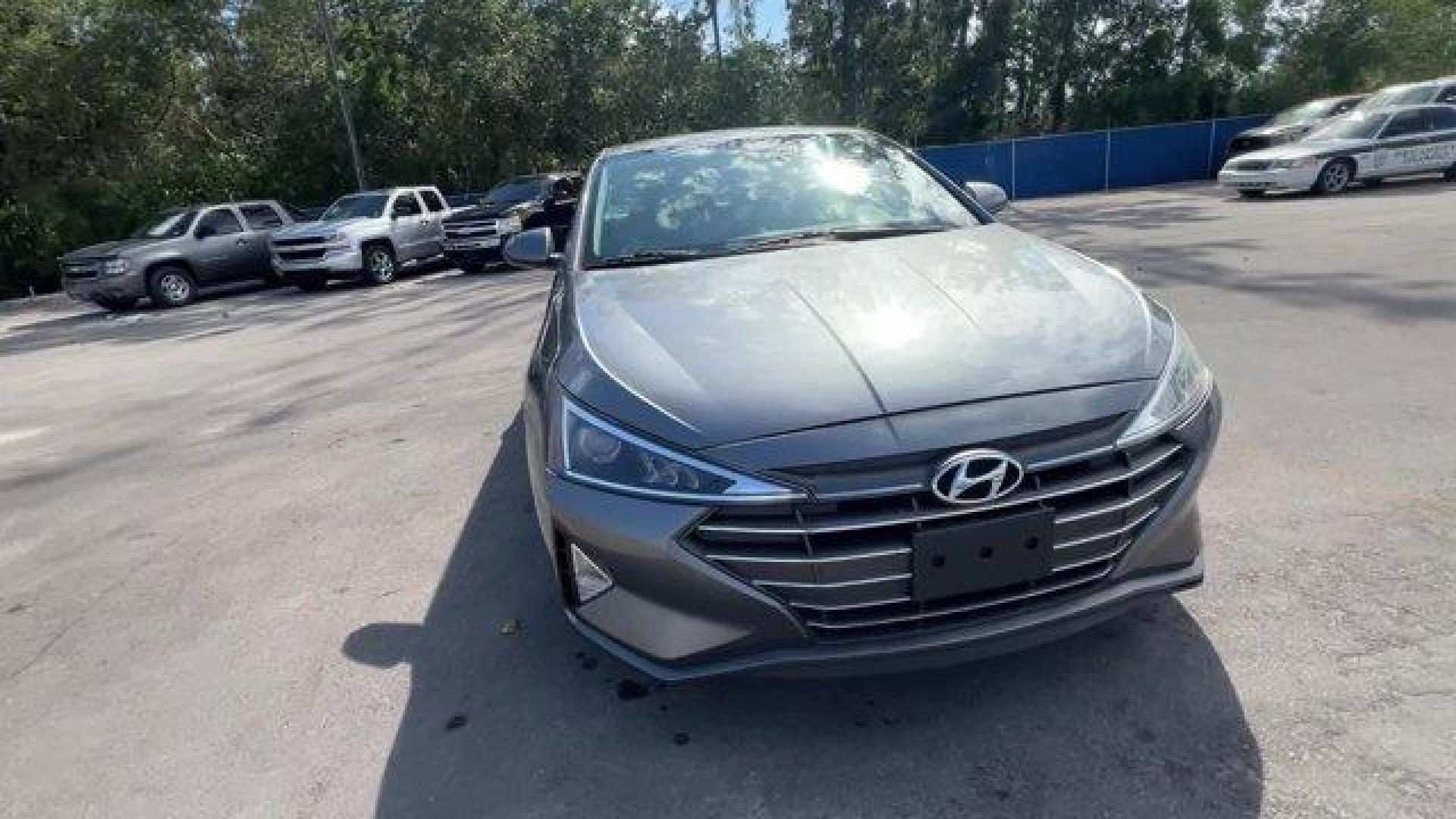 2019 Machine Gray /Gray Hyundai Elantra (5NPD74LF1KH) with an 4 2.0 L engine, Automatic transmission, located at 27610 S Dixie Hwy, Homestead, FL, 33032, (305) 749-2348, 25.510241, -80.438301 - Boasts 38 Highway MPG and 29 City MPG! This Hyundai Elantra boasts a Regular Unleaded I-4 2.0 L/122 engine powering this Automatic transmission. OPTION GROUP 01, MACHINE GRAY, GRAY, PREMIUM CLOTH SEAT TRIM.* This Hyundai Elantra Features the Following Options *CARPETED FLOOR MATS, Window Grid Antenn - Photo#7